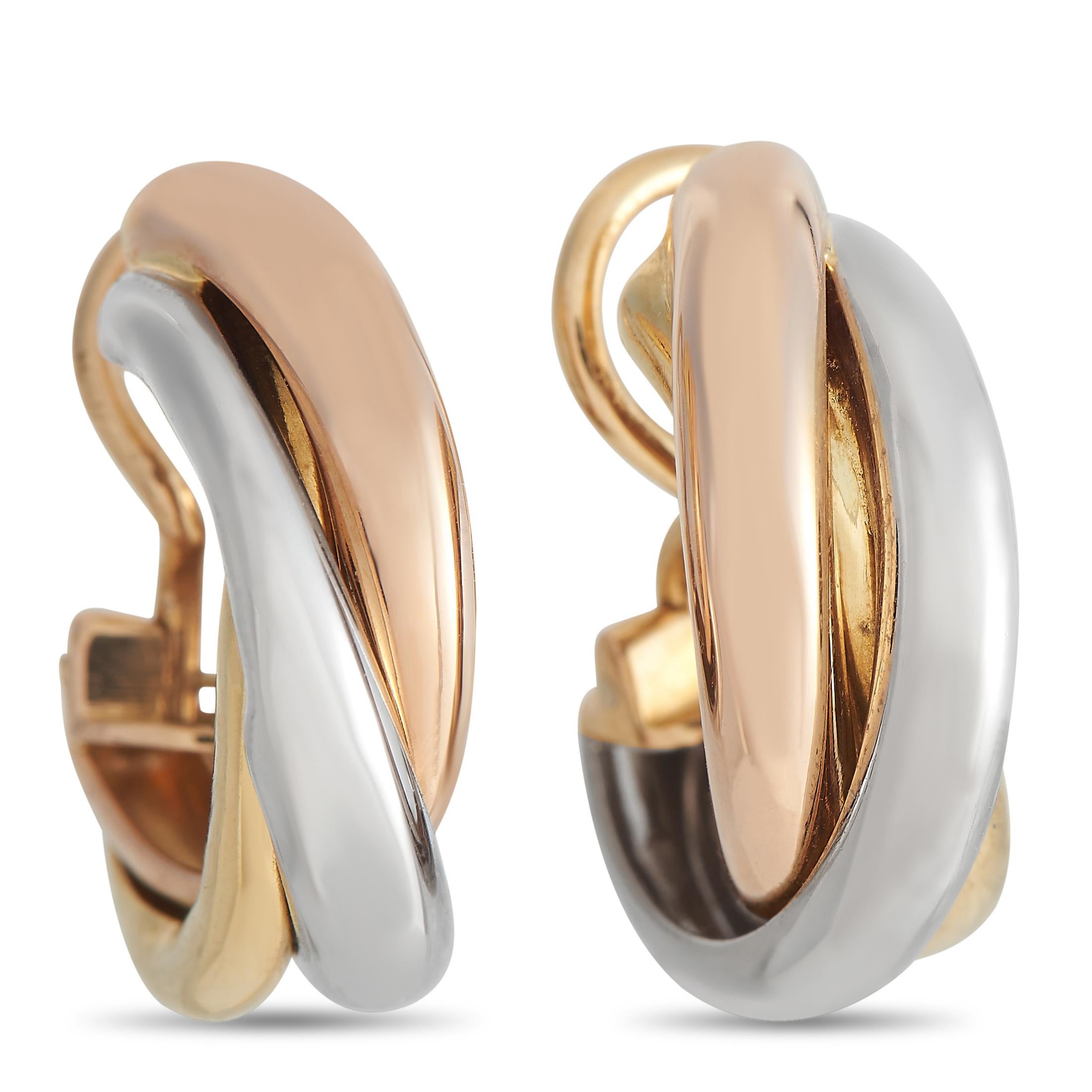 Just as their name suggests, these Cartier Trinity earrings feature a trio of glistening precious metals. Bold bands of 18K Yellow Gold, 18K Rose Gold, and 18K White Gold come together in perfect harmony on these exquisite luxury earrings, which