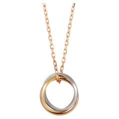 Cartier Collier Trinity en or jaune, rose et blanc 18 carats avec bague
