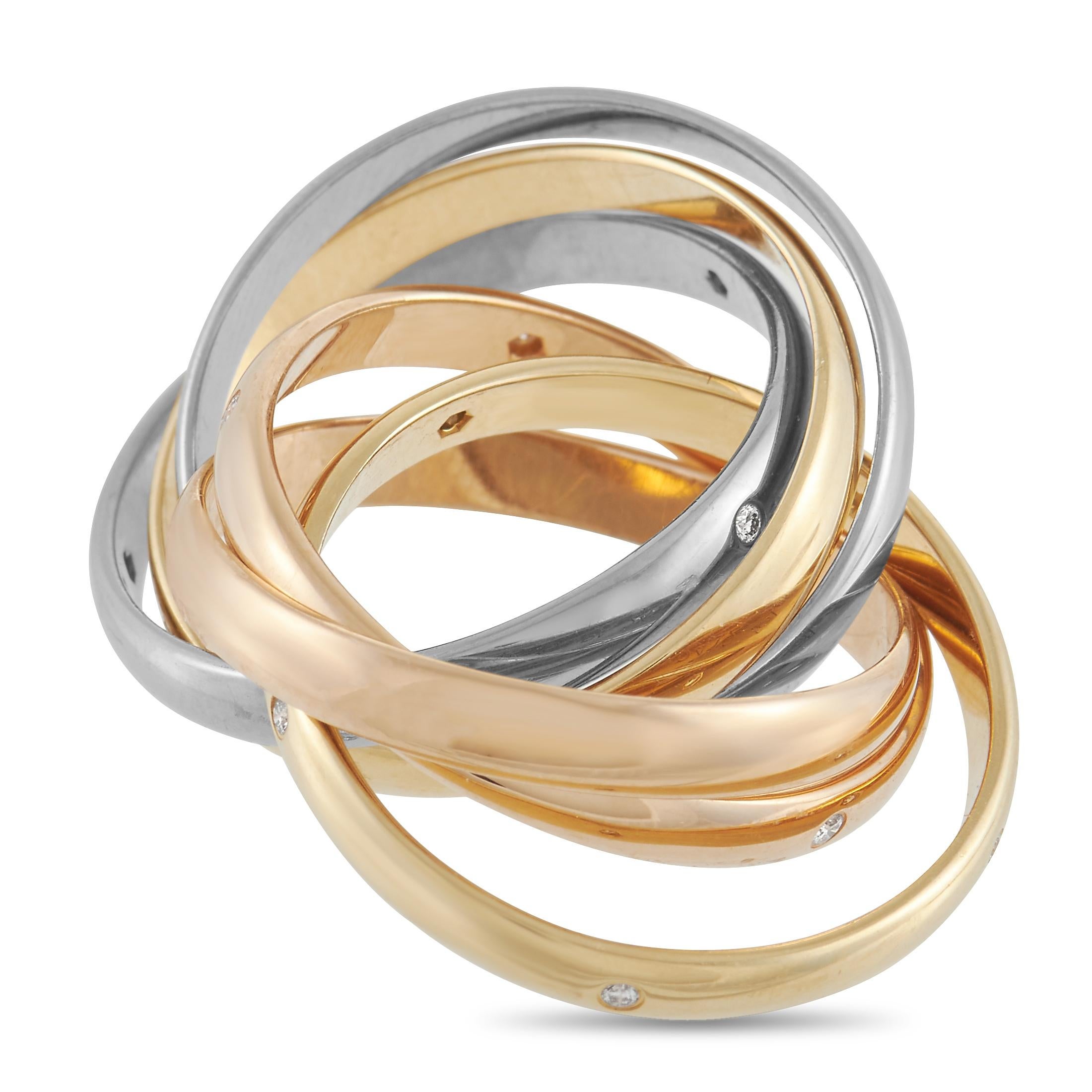 This exquisitely crafted ring from the Cartier Trinity collection is an intricate piece that will instantly capture your imagination. A total of 6 bands - made from 18K Yellow, White, and Rose Gold - come together to create this dynamic design,