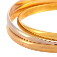 Cartier Trinity 18 Karat Yellow, White and Rose Gold Rolling Bangle Bracelet