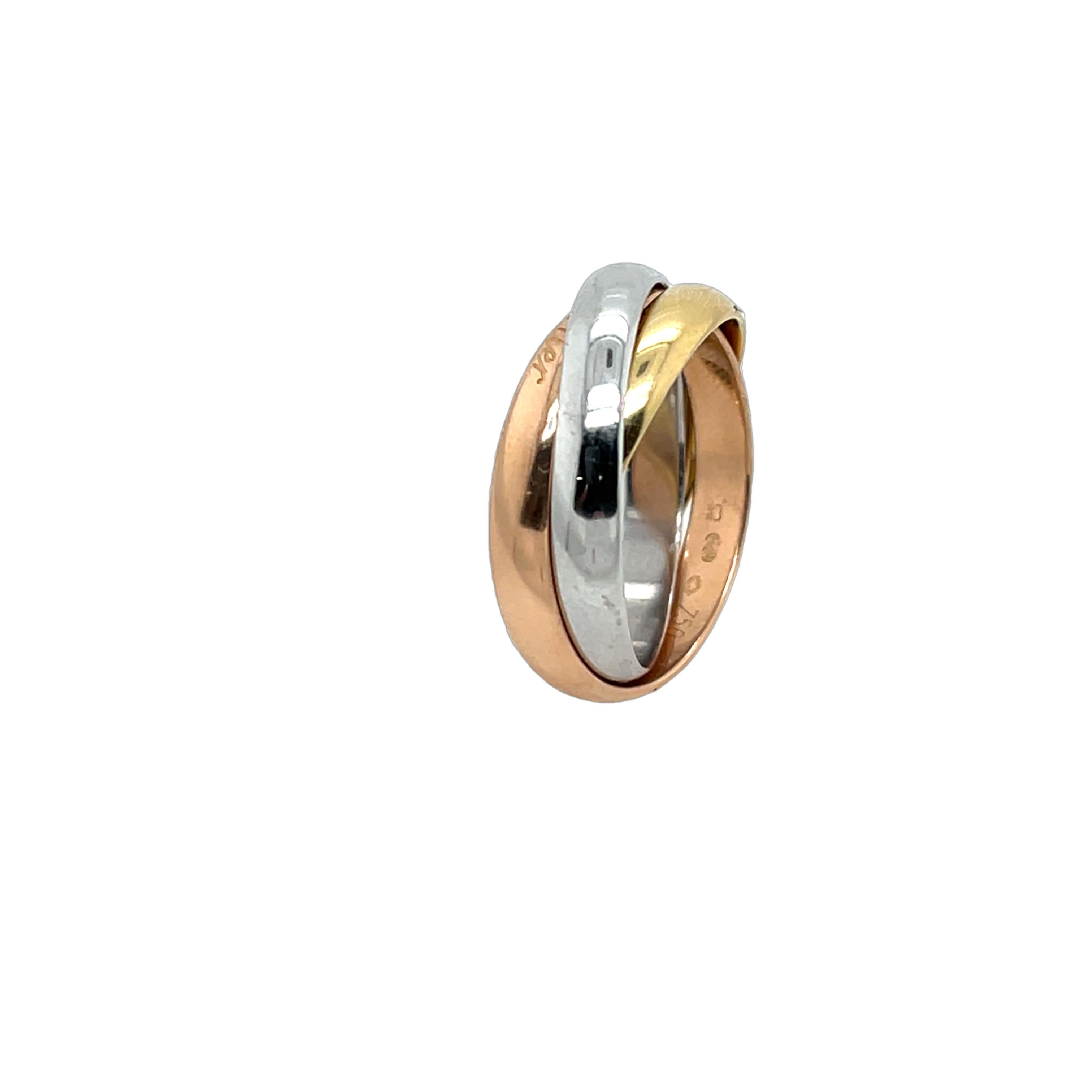 A timeless Cartier Trinity Ring, crafted in 18ct yellow, white, and rose gold. 
This elegant design features three interlocking bands, 
representing love, fidelity, and friendship. 
A true icon of Cartier’s heritage, 
perfect for everyday wear or as