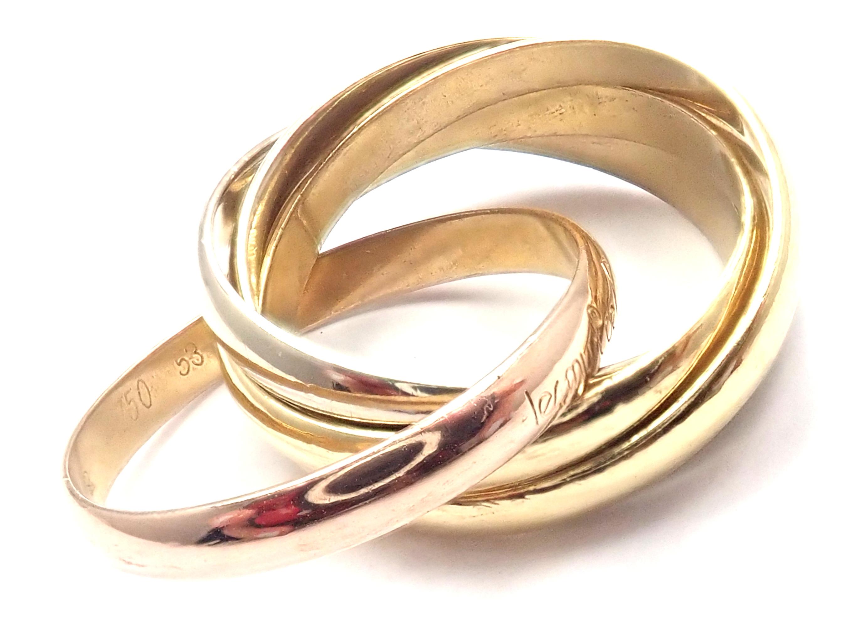 18k Tri-Color Gold Trinity 5 Band Ring von Cartier. 
Einzelheiten: 
Ringgröße: Europäisch 53:: US 6 1/4
Bandweite: 9mm
Gewicht: 8.8 Gramm
Gestempelte Punzierungen: Cartier Paris 53 Seriennummer weggelassen
*Freier Versand innerhalb der Vereinigten