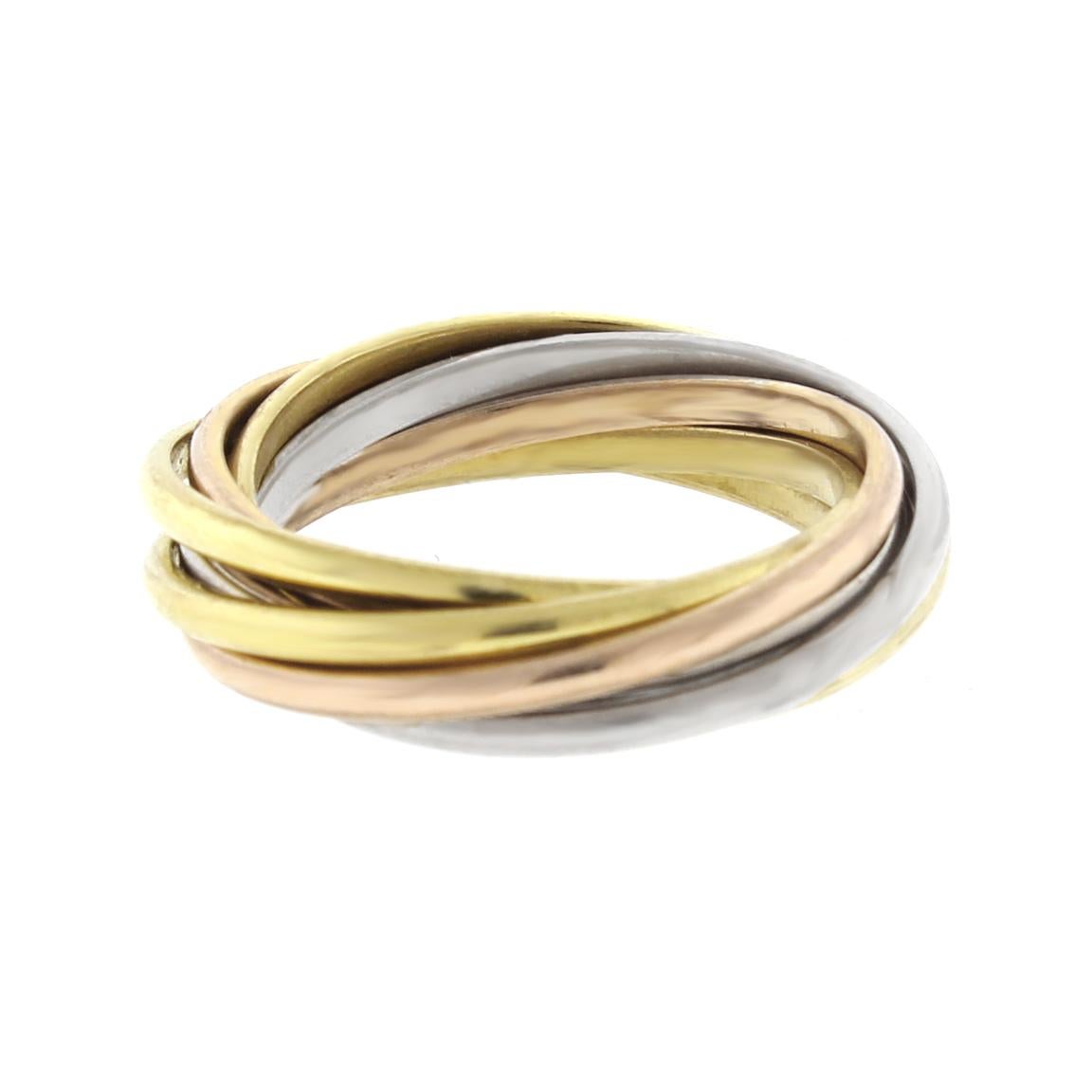 Three bands. Three colors. Pink gold, yellow gold and white gold, intertwined in a display of mystery and harmony. Cartier’s timeless trinity ring.
♦ Designer: Cartier 
♦ Metal: 18 karat white yellow and pink gold
♦ Size 50   US5 ½
♦ Circa 1995
♦