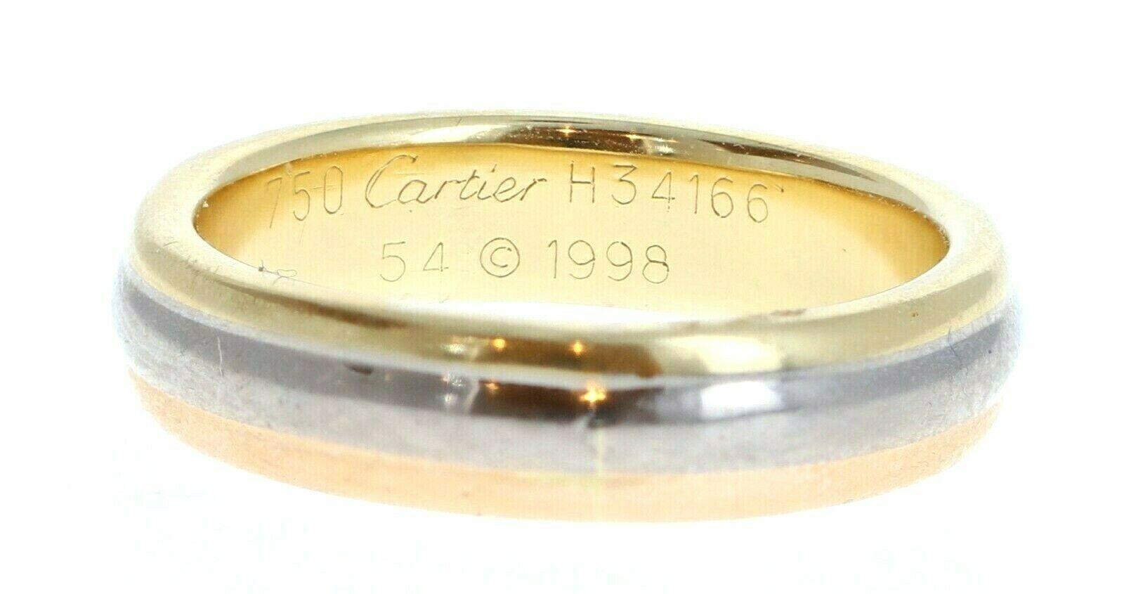 Cartier Trinity Band 18k Yellow Rose & White Gold 4.6mm 7.7g Size 54 

For sale is a cartier trinity band ring 18k tri color gold
The ring is a size 54 US size 7
 Perfect worn day or night.
 Get this stunning ring now!



Metal: 18k White Yellow and