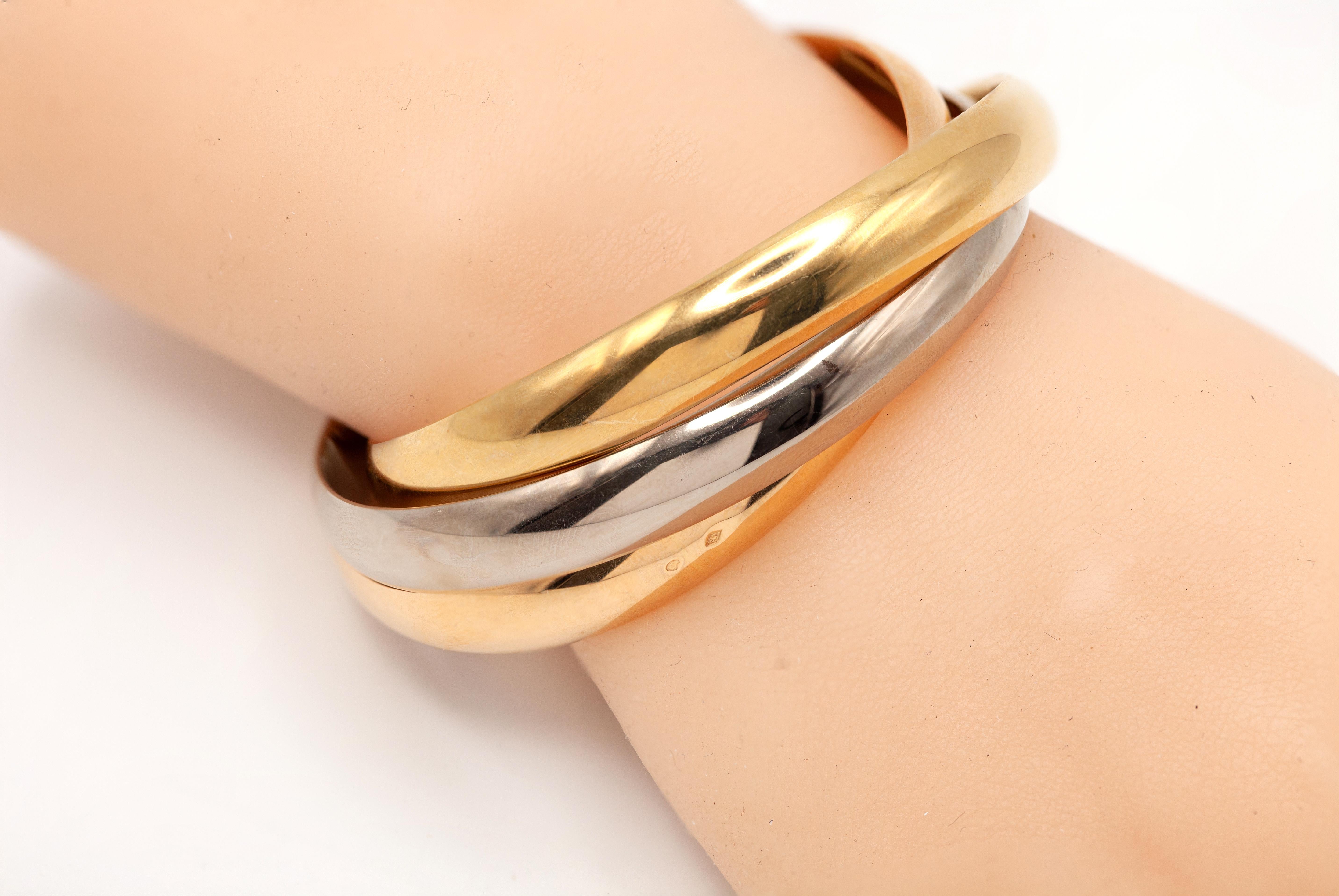 Modern Cartier Trinity 18 Karat Tri-Color Gold Rolling Bangle Bracelet For Sale