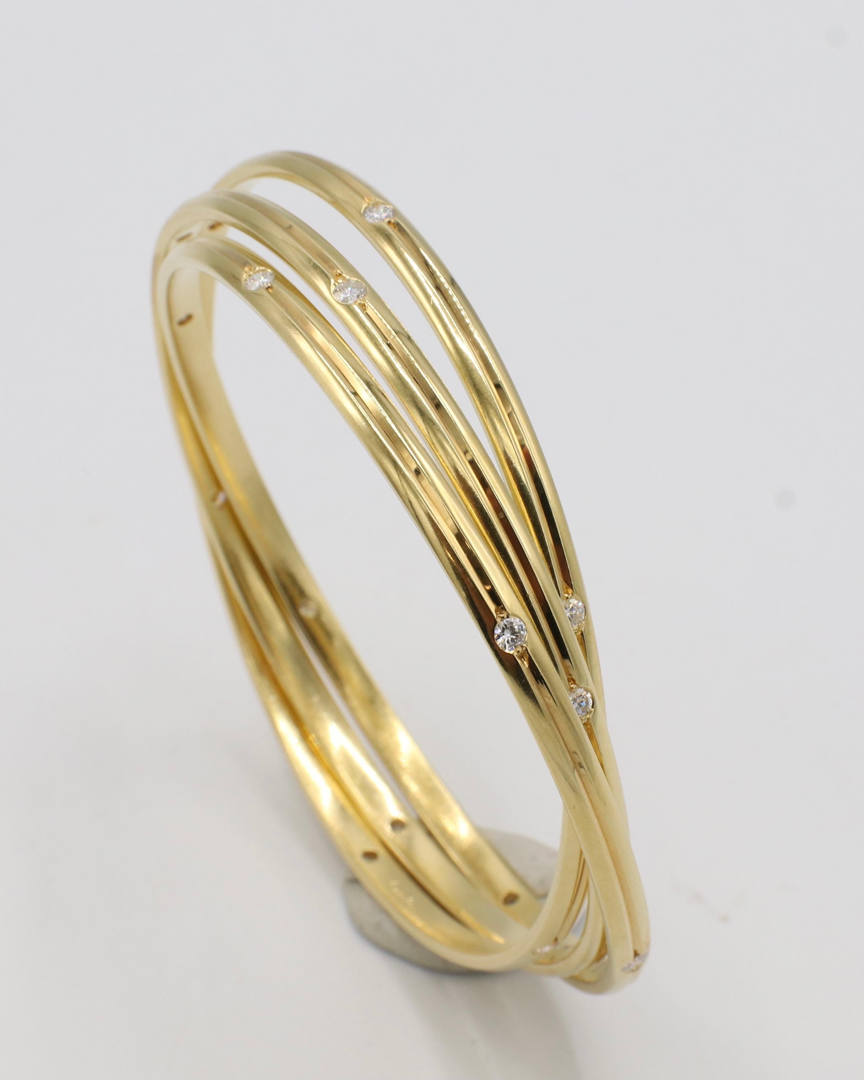 Cartier Trinity Constellation Yellow Gold Natural Diamond Bangle Bracelet In Excellent Condition For Sale In  Baltimore, MD