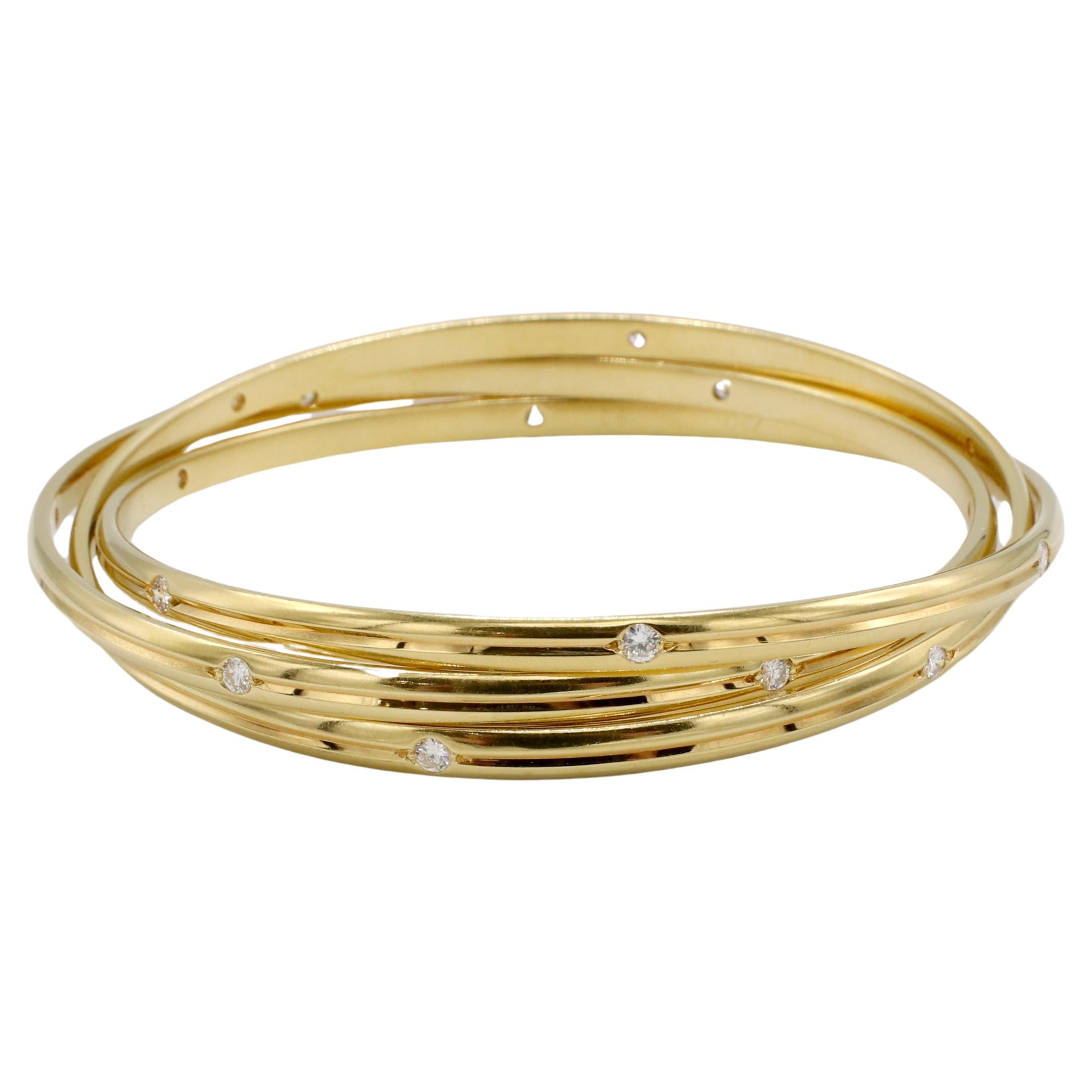 Cartier Trinity Constellation Yellow Gold Natural Diamond Bangle Bracelet For Sale