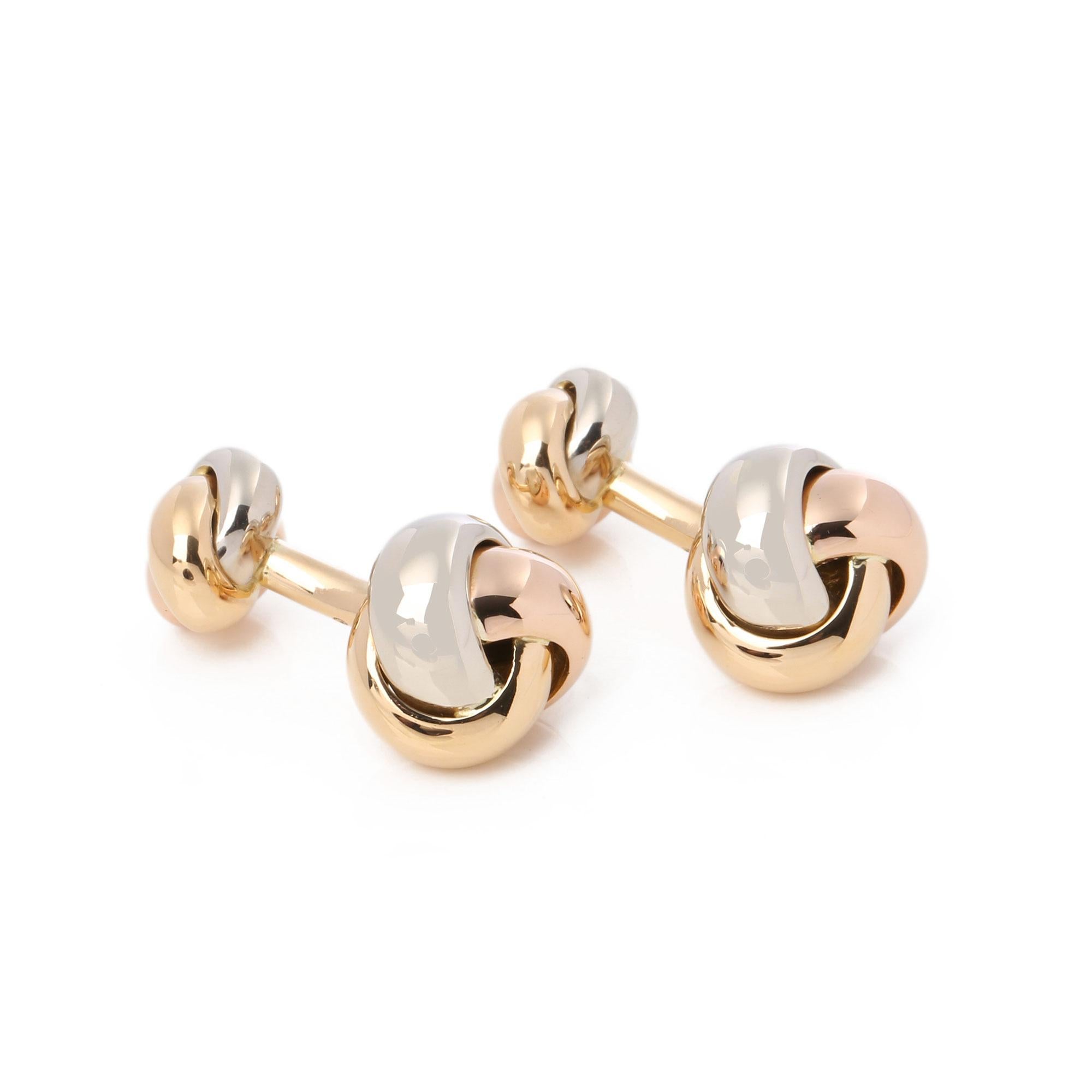 These cufflinks by Cartier are from their Trinity collection and feature the iconic knot design in 18ct white gold, 18ct yellow gold and 18ct rose gold. 