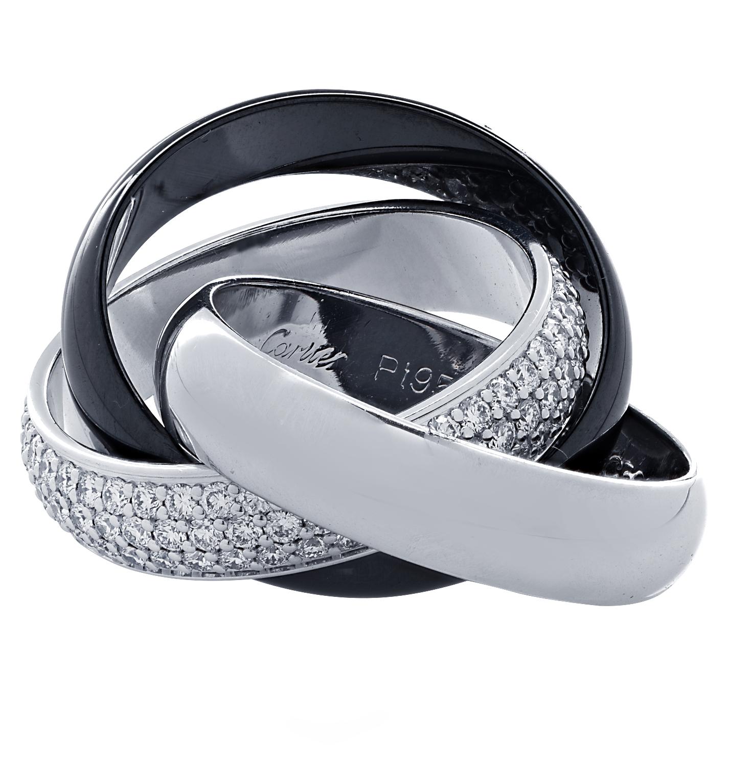 Cartier Trinity de Cartier ring featuring three interlocking bands, one 18 karat white gold, one black ceramic band and one 18 karat white gold band encrusted with 129 pave set diamonds weighing approximately 1.54 carats total, F color, VS clarity.