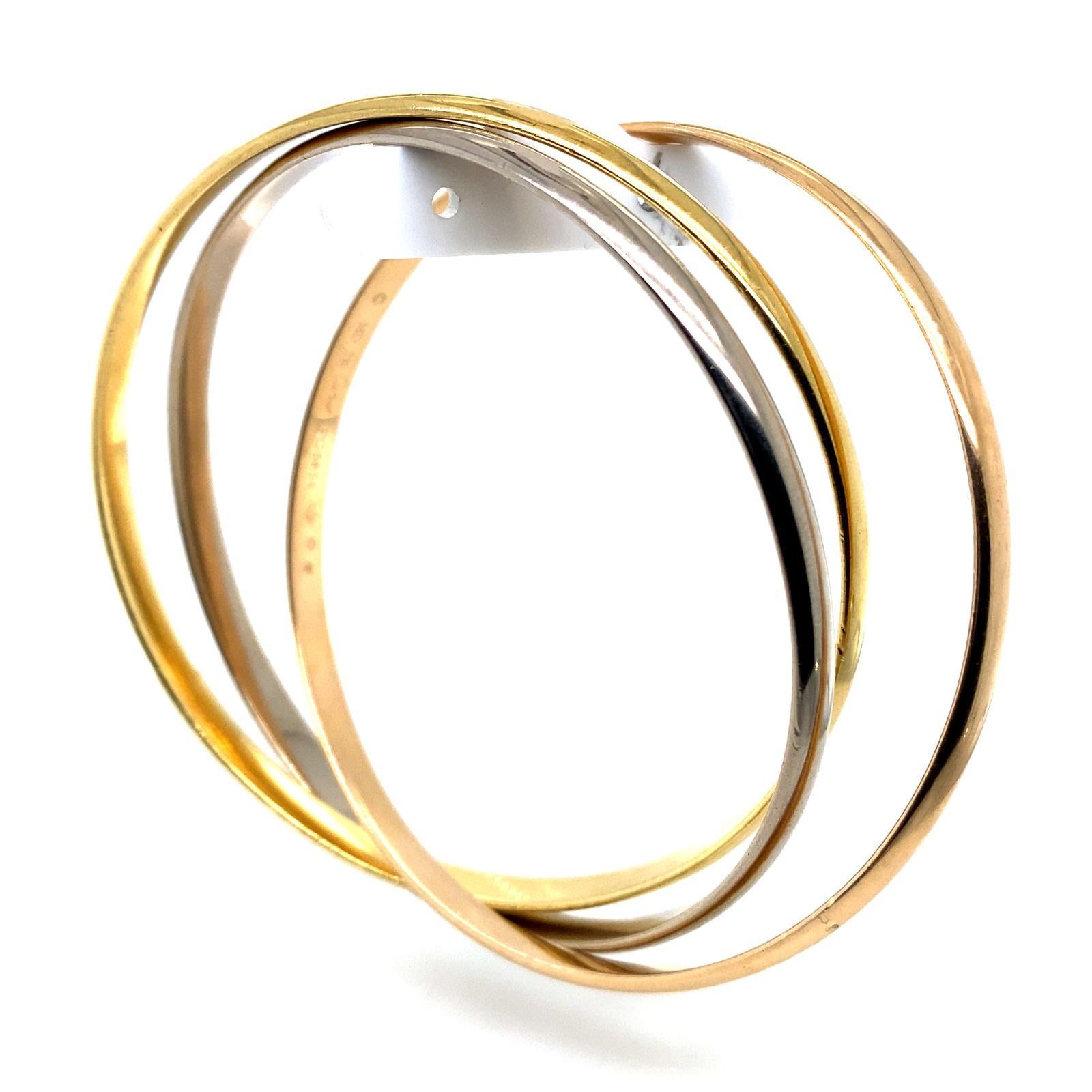 Rétro Bracelet à trois bracelets 'Trinity de Cartier' de Cartier en vente