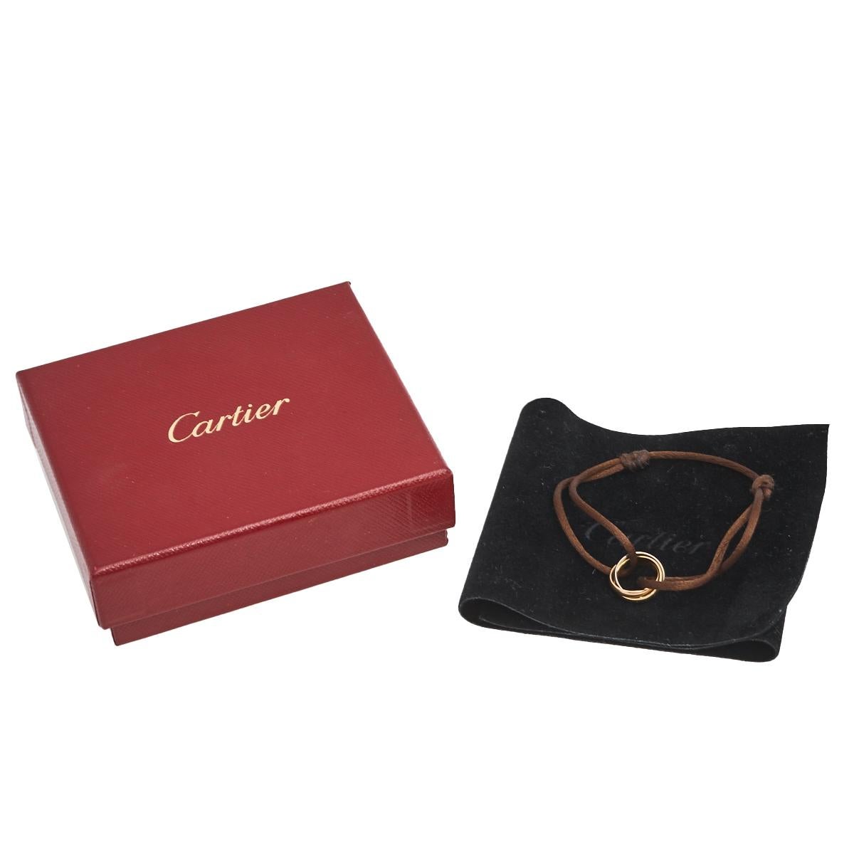 Cartier is known for making jewelry that blends art with meaning. Symbolizing that very spirit is this Trinity bracelet. The central piece is a set of three rings crafted from 18k rose, yellow and white gold each symbolizing love, fidelity, and