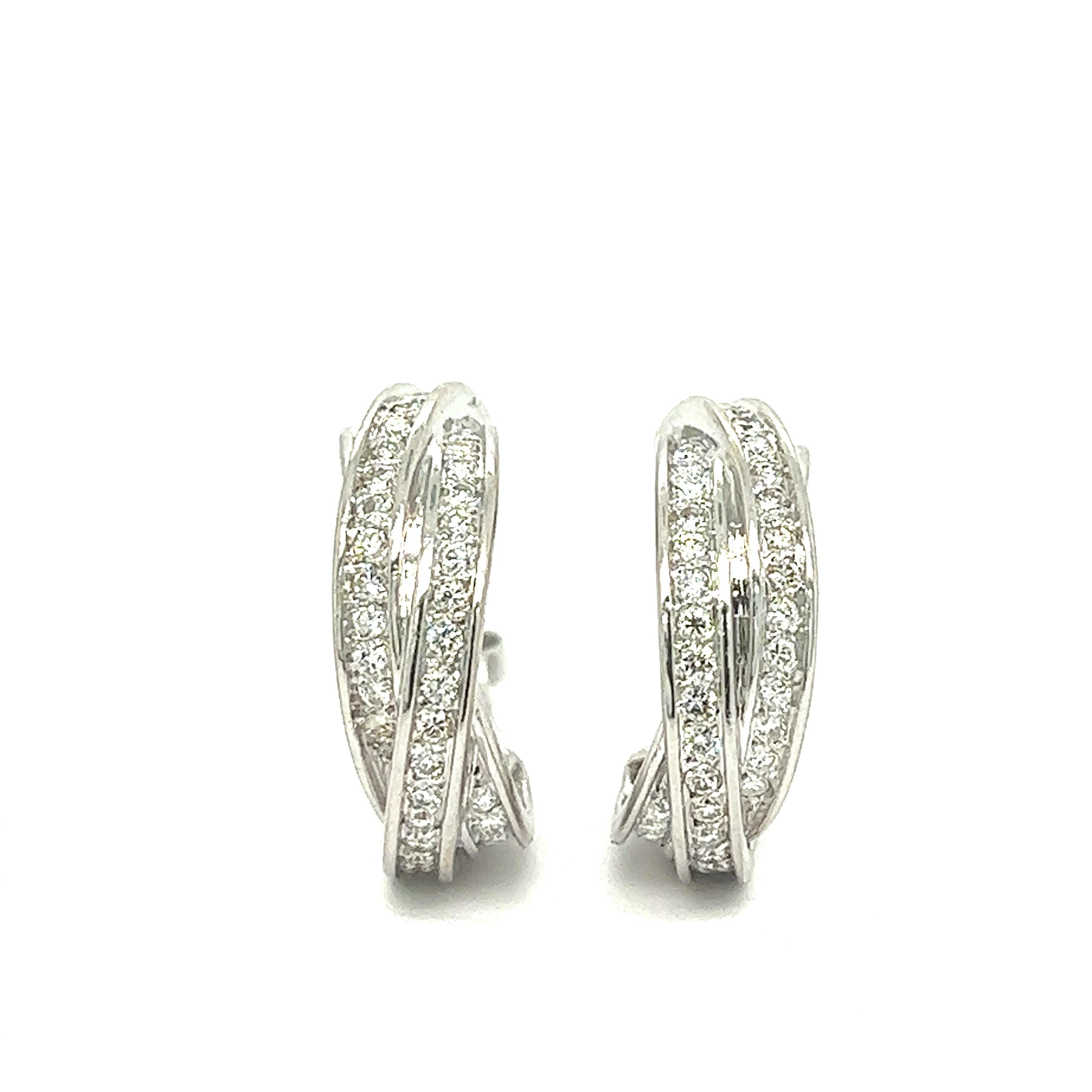 Cartier Trinity Diamant-Ohrringe aus 18 Karat Weißgold

Aus der kultigen Trinity Collection stammt dieses wunderschöne Paar Ohrringe aus 18 Karat Weißgold mit atemberaubenden Diamanten im Rundschliff; markiert Cartier, 750, 289373

Größe: Breite 7