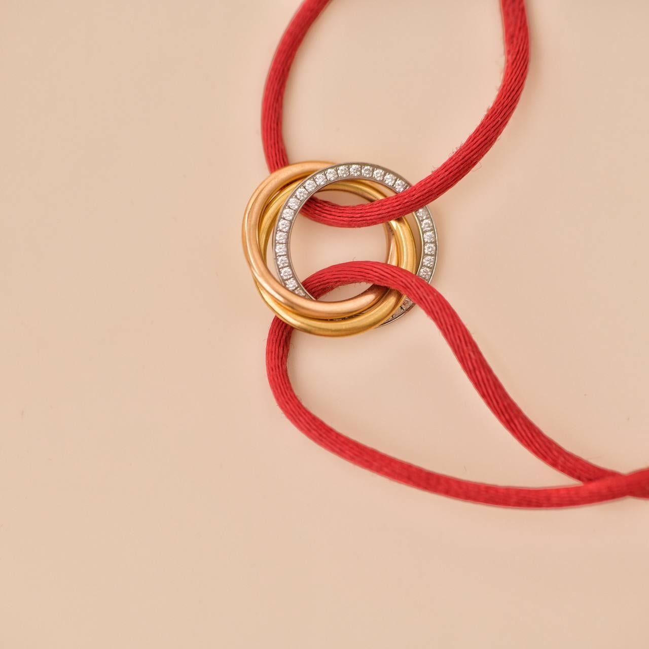 Cartier Trinity Diamond 18K Yellow Rose and White Gold Red Cord Bracelet 2