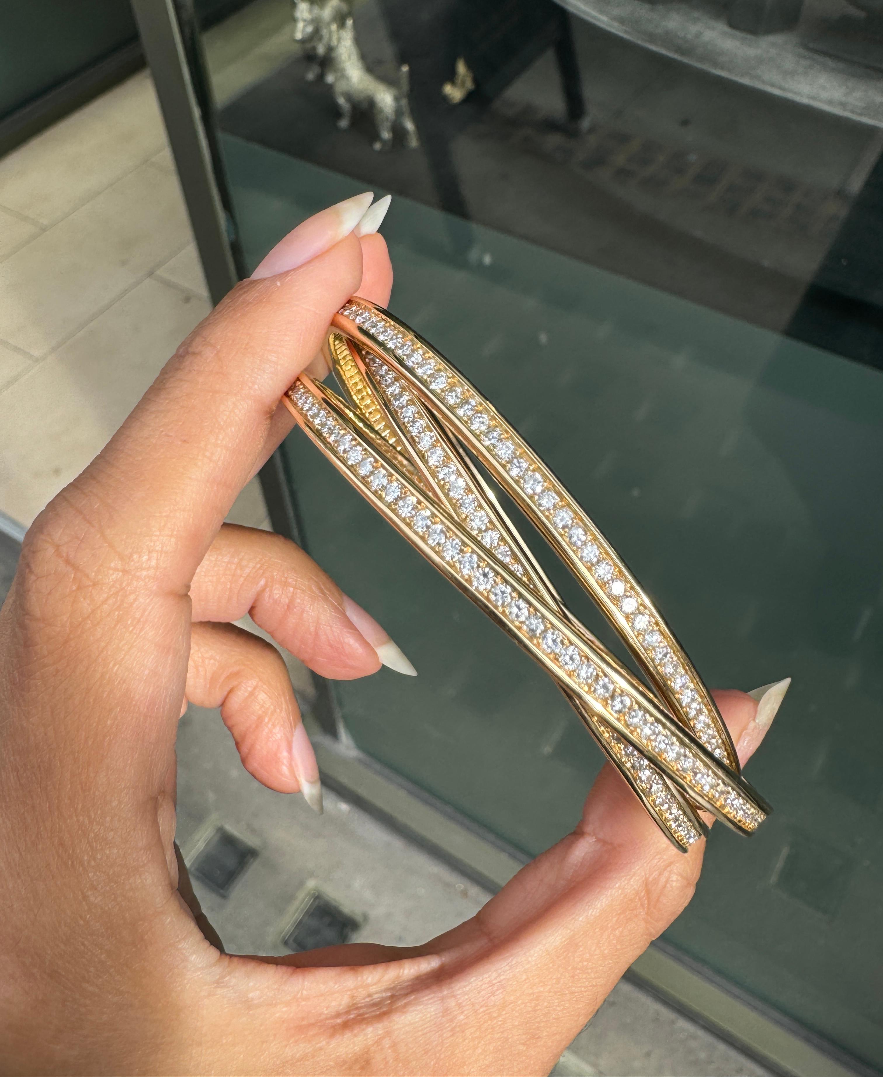 Bracelet trinitaire en or jaune 18 carats et diamants de Cartier en vente 4