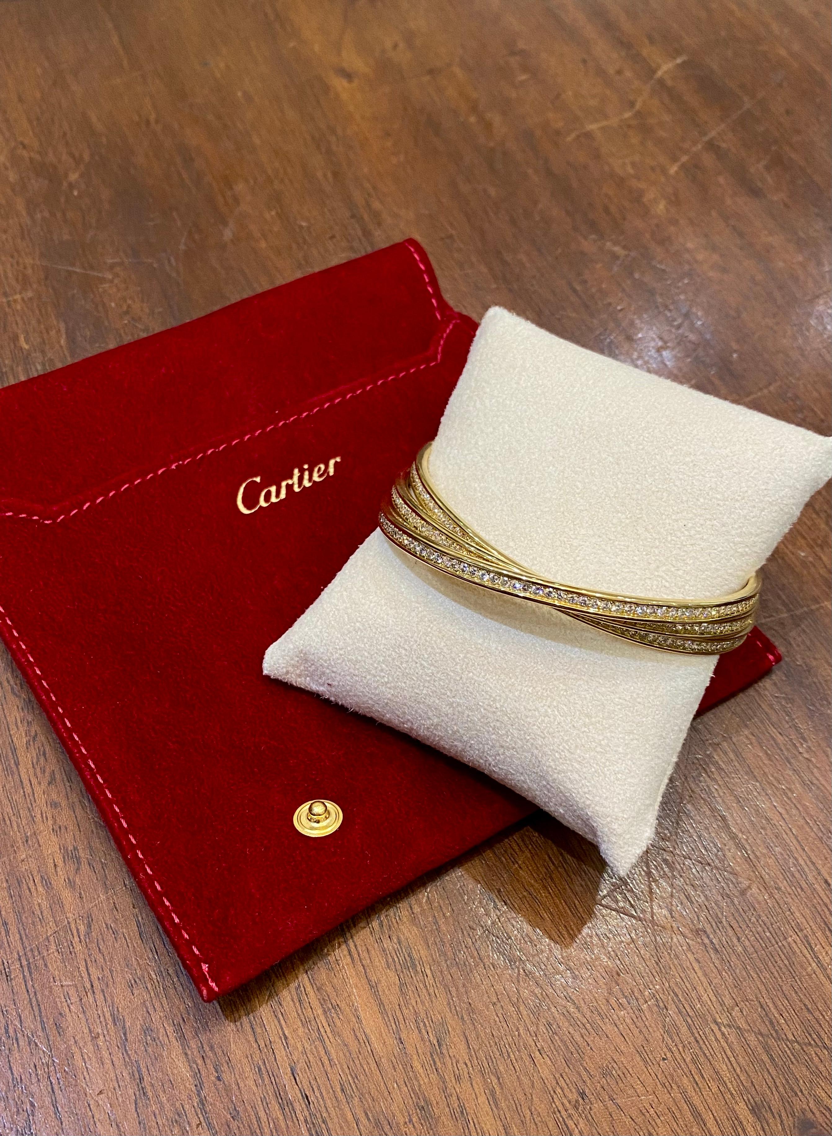 Bracelet trinitaire en or jaune 18 carats et diamants de Cartier en vente 5