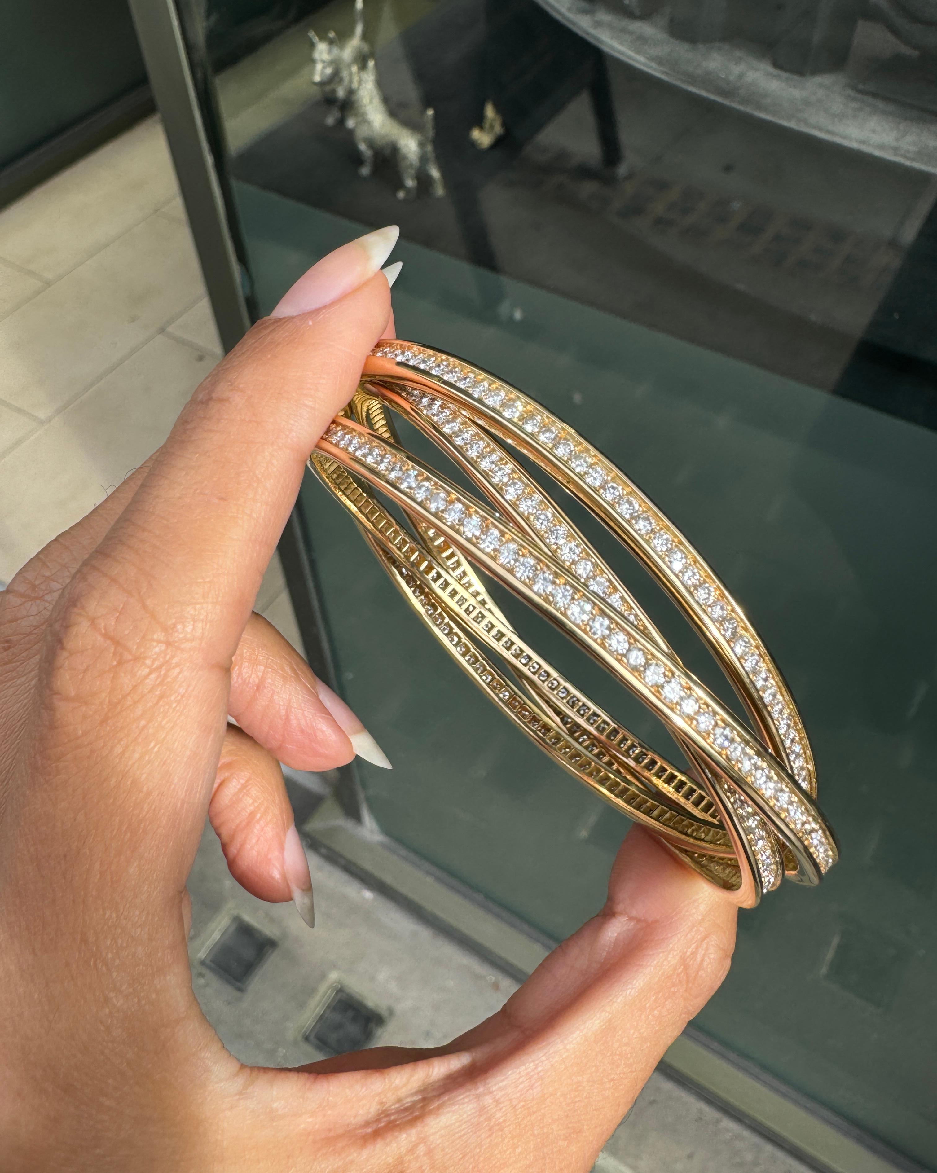 Bracelet trinitaire en or jaune 18 carats et diamants de Cartier en vente 2