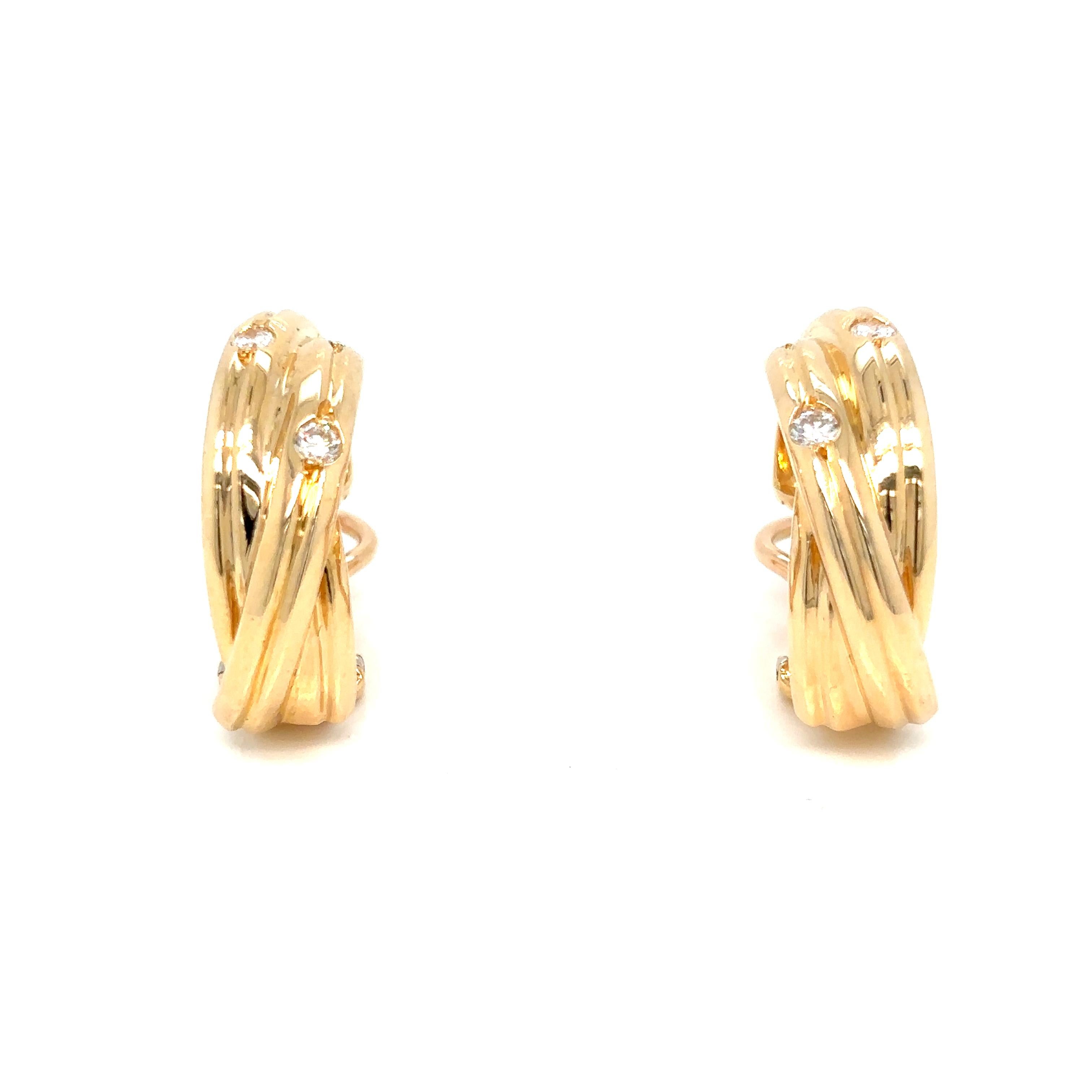 Cartier Trinity Diamond Hoop Earrings, each of three interwoven half hoops in 18ct yellow gold and set with five round brilliant diamonds to a post and hinge fitting and presented in their original box

Diameter 2cm
Width 0.6cm
Total estimated