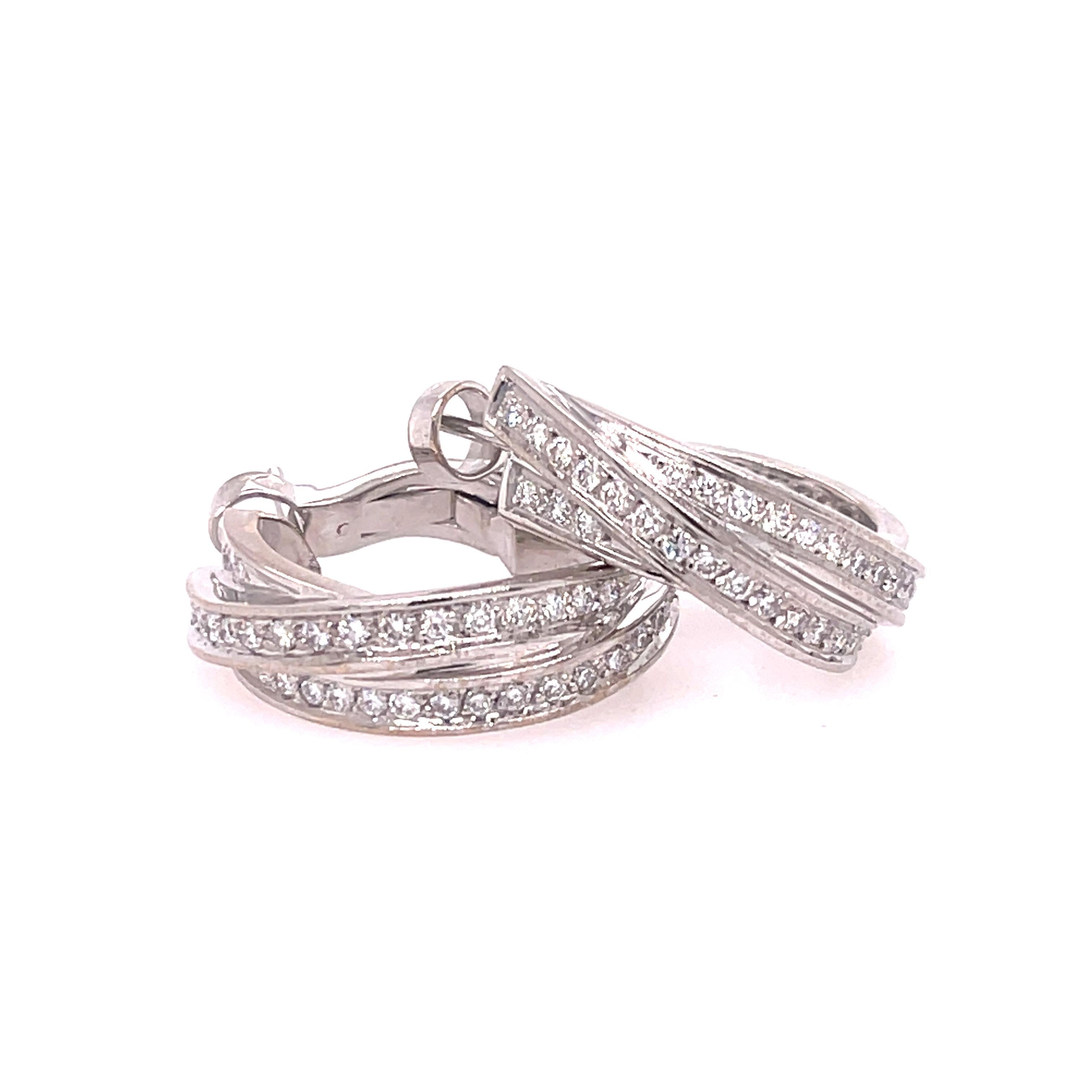 Cartier Trinity Diamond Hoops en or blanc 18 carats. Les anneaux comportent environ 1,20 ctw de diamants ronds brillants, de couleur G et de pureté VS.