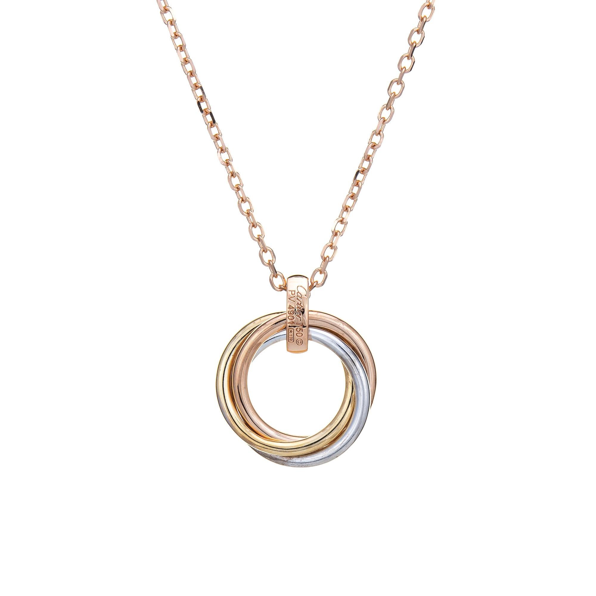 Pre-owned Cartier Trinity necklace crafted in 18k yellow, white & rose gold.  

The Cartier necklace features bands of 18k rose, yellow & white gold with a diamond set bale. Each band measures 1.8mm wide. The necklace is great worn alone or layered