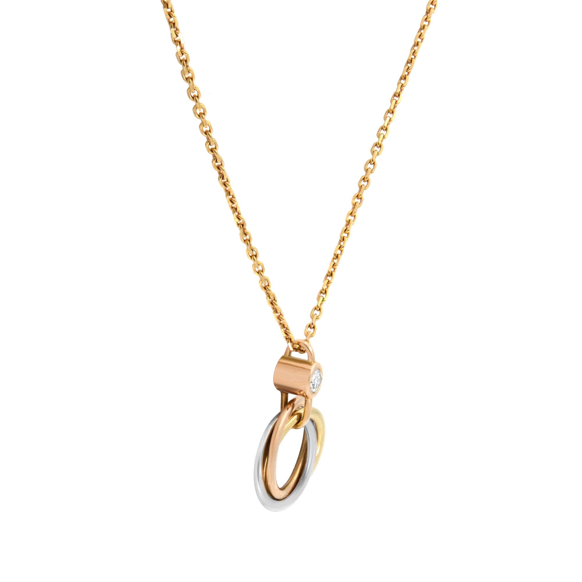 Cartier Trinity necklace in 18K white gold, 18K rose gold and 18K yellow gold. The pendant is set with 1 brilliant cut diamond totaling 0.04 carats. Rose gold chain. Pendant size 15.00mm. Chain length: 16 inches. Excellent pre-owned condition.