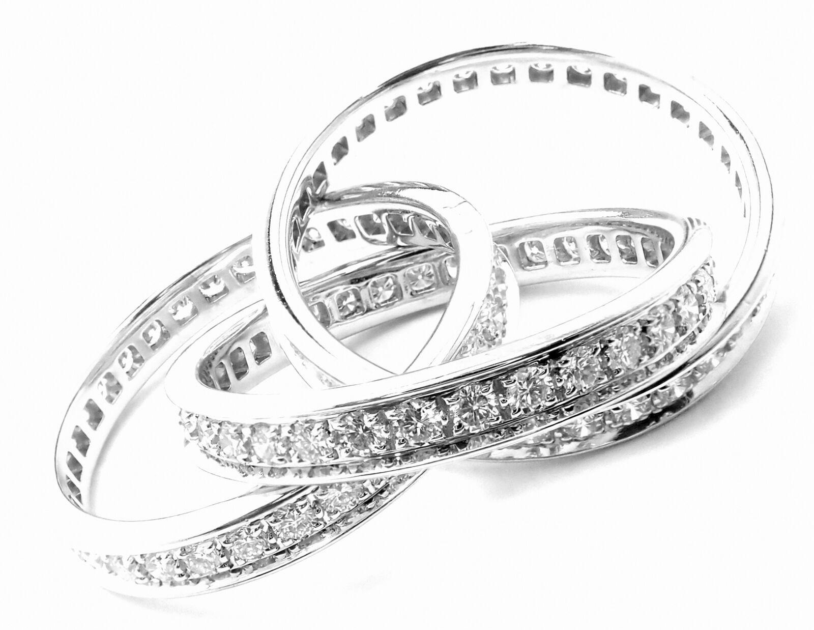 18k White Gold Diamond Trinity Band Ring by Cartier.  
With 96 Round Brilliant cut diamonds VVS1 clarity, F-H color total weight approx. 1.50ct  
This ring comes with Cartier box.  
Details:  
Size: European 53 US 6 1/4
Weight: 10.3 grams  
Width: