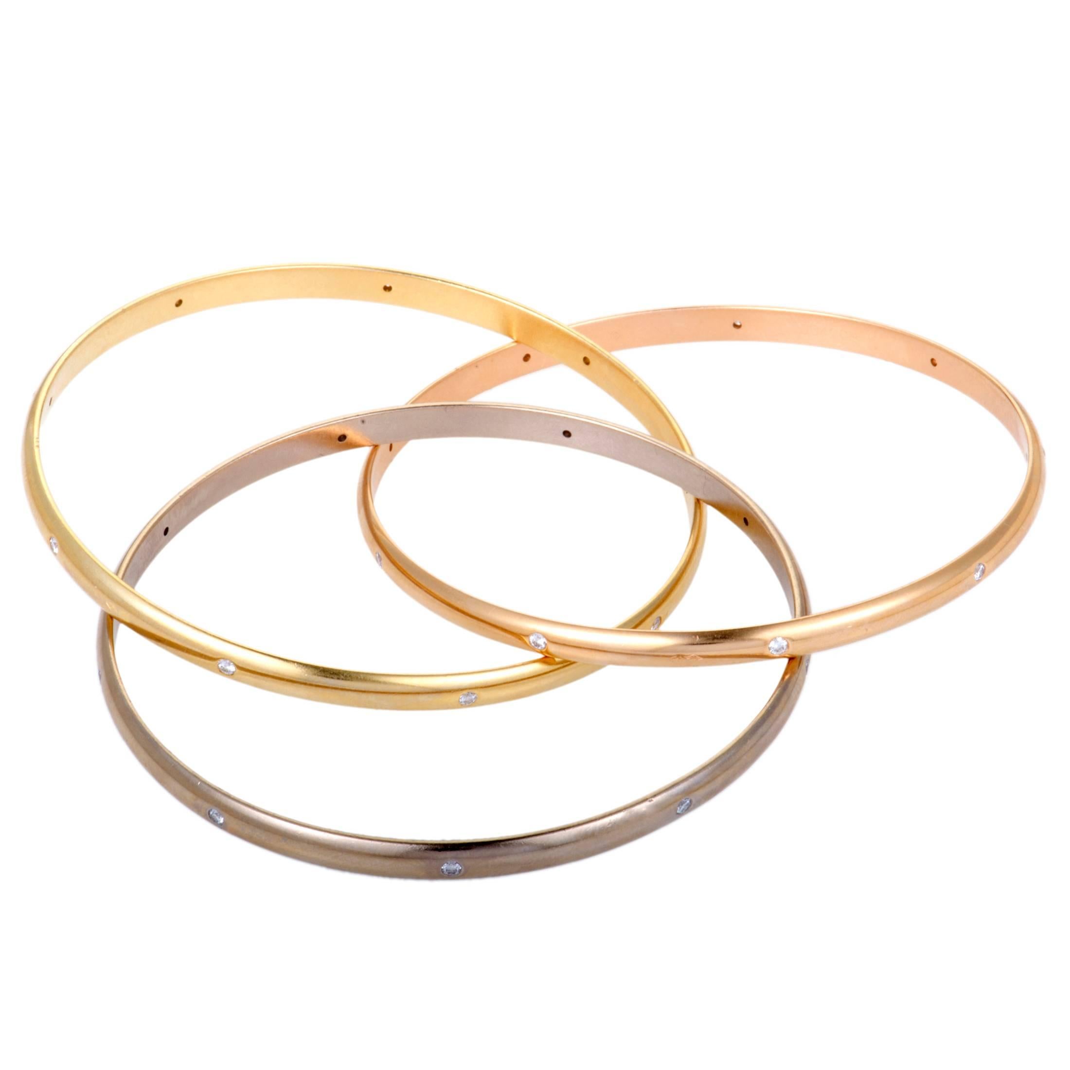 This gorgeous Cartier Trinity bangle bracelet is designed in the brand’s renowned fashion and offers a look that combines eye-catching style with timeless elegance. Each bangle is crafted from either 18K white, 18K yellow or 18K rose gold, and is