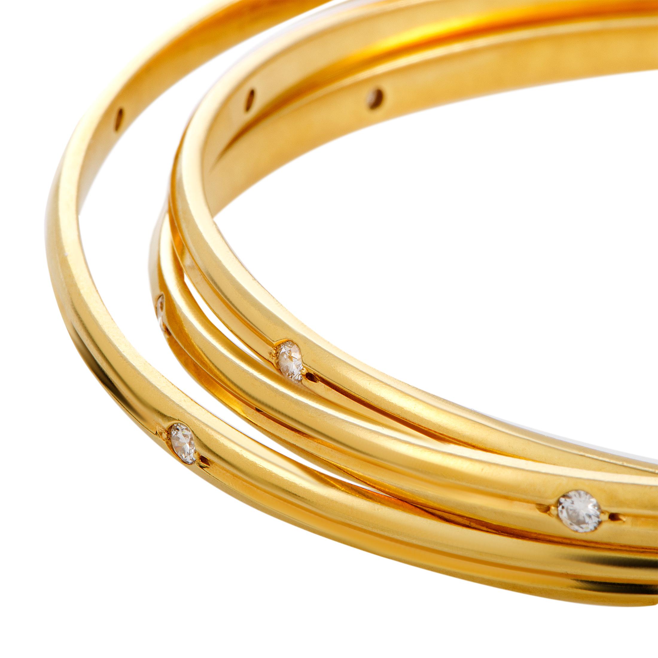 Cartier Trinity Diamond Yellow Gold Rolling Bangle Bracelet In Excellent Condition In Southampton, PA