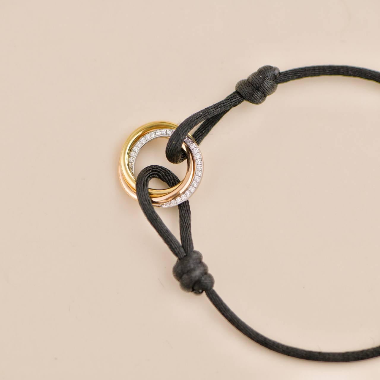 Cartier Trinity Diamond Yellow White and Rose Gold Black Cord Bracelet In Excellent Condition In Banbury, GB