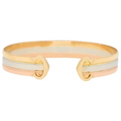 Cartier Trinity Double C Tricolor Bangle Set in oro rosa, bianco e giallo 18 ct.