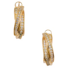CARTIER Trinity earrings in yellow gold and diamonds