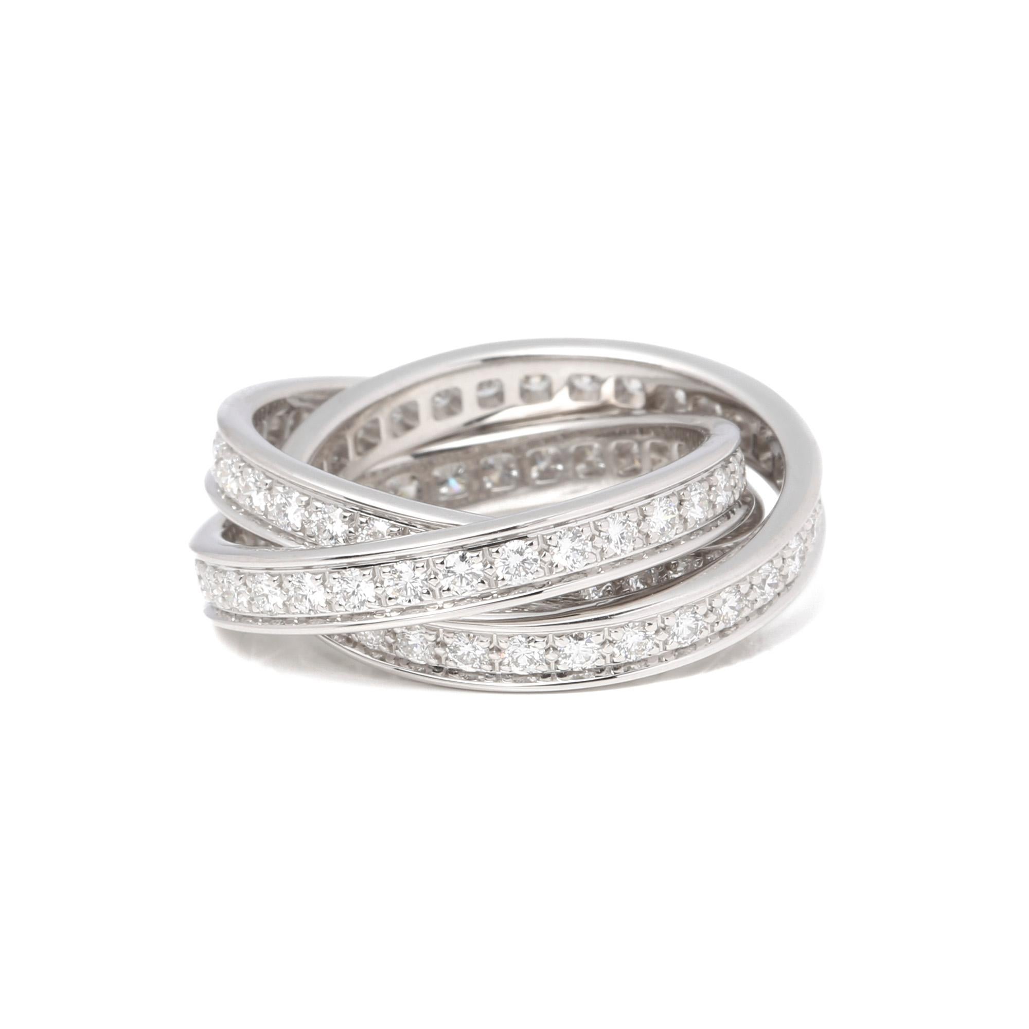 This ring by Cartier is from their Trinity collection and features 90 round brilliant diamonds, totalling 1.6ct, clarity VS, colour G/H, made in 18ct white gold setting. UK ring size L. EU ring size 51. US ring size 6. This ring cannot be resized.