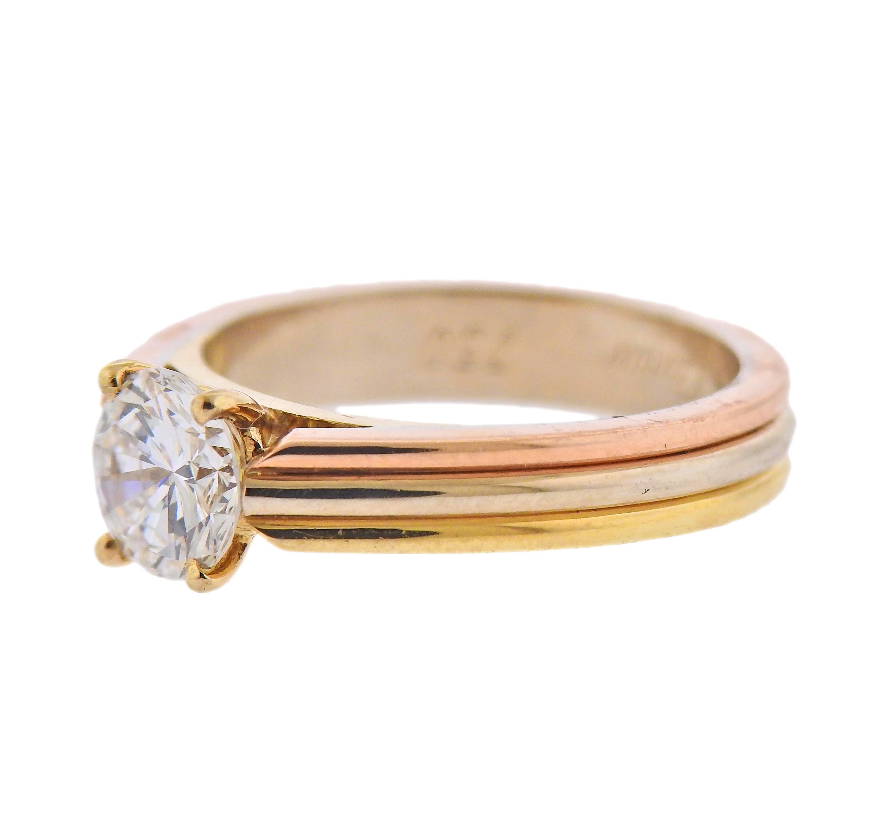 Cartier Trinity 18k tri color gold engagement ring with center GIA 0.91ct G/VVS2 diamond. Ring size 5.25. Marked: Cartier, 750. Weight - 5.5 grams. 