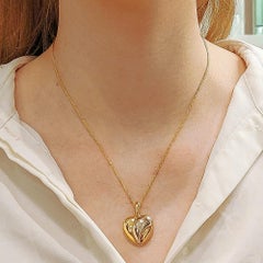 Cartier Trinity Heart Pendant in Yellow, Rose and White Gold