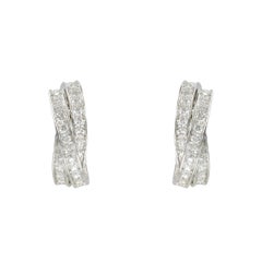 Pendientes de clip con diamantes «Trinity» de Cartier, con diseño «Inside Out», estilo francés