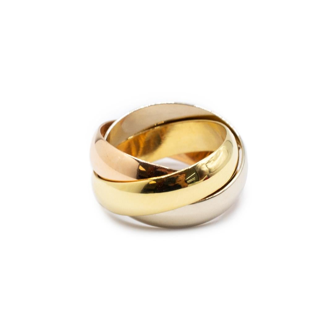 Brand: Cartier

Metal Type: 18K tri-color Gold

Size: 5.5

Weight: 13.96 grams

Ladies designer made 18K tri-color gold interlocking anniversary wedding band with a half-round shank.  Engraved with 