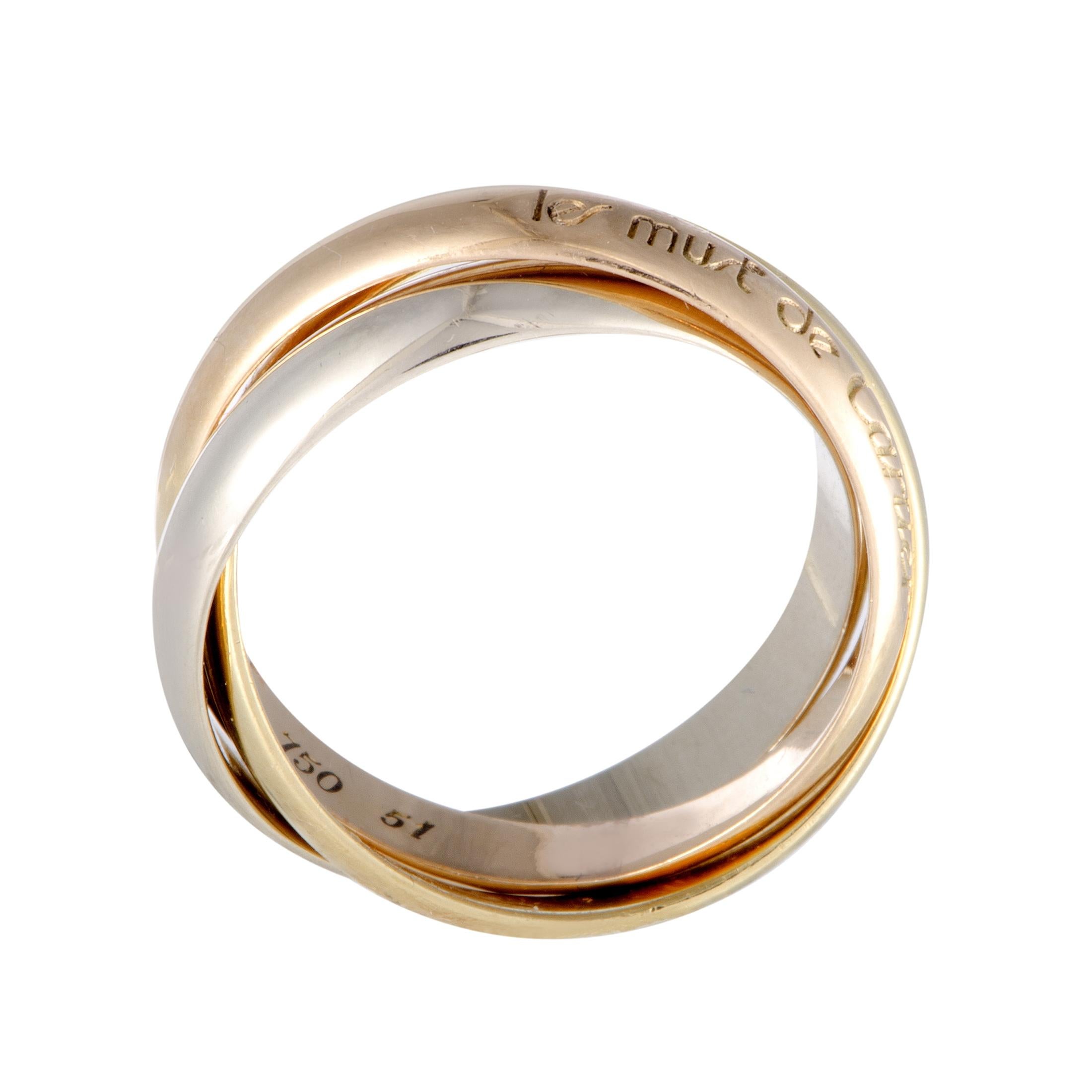 A classic piece from the renowned French jewelry maker, this Cartier Trinity ring compels with its timelessly elegant allure. It is comprised of three bands, each made of 18K yellow, white and rose gold.