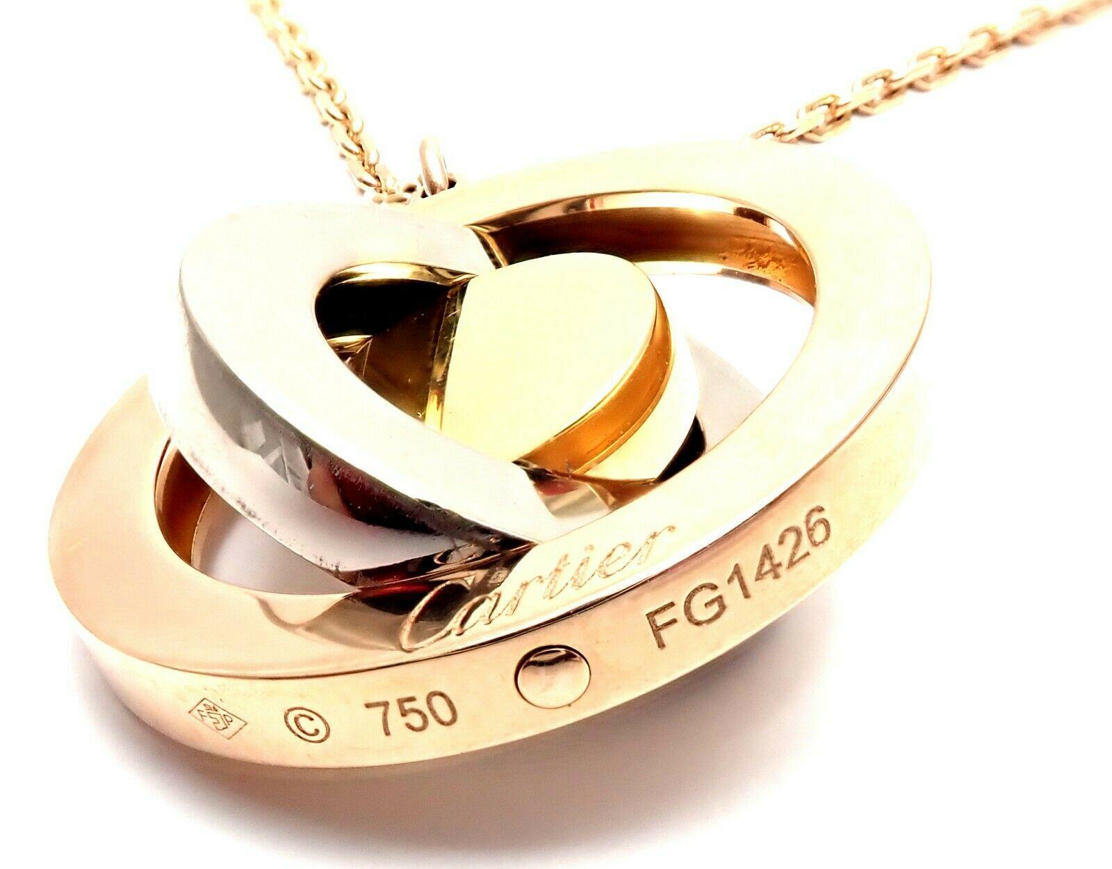 18k Tri-Color Gold Movable Disc Pendant Necklace by Cartier.  
Details:  
Pendant: Pendant : 22mm
Chain: 16