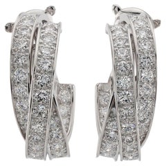 CARTIER Boucles d'oreilles larges Inside Out en or blanc et diamants naturels Trinity
