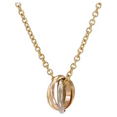 Cartier Trinity-Halskette aus 18 Karat Weiß-Gelb-Roségold