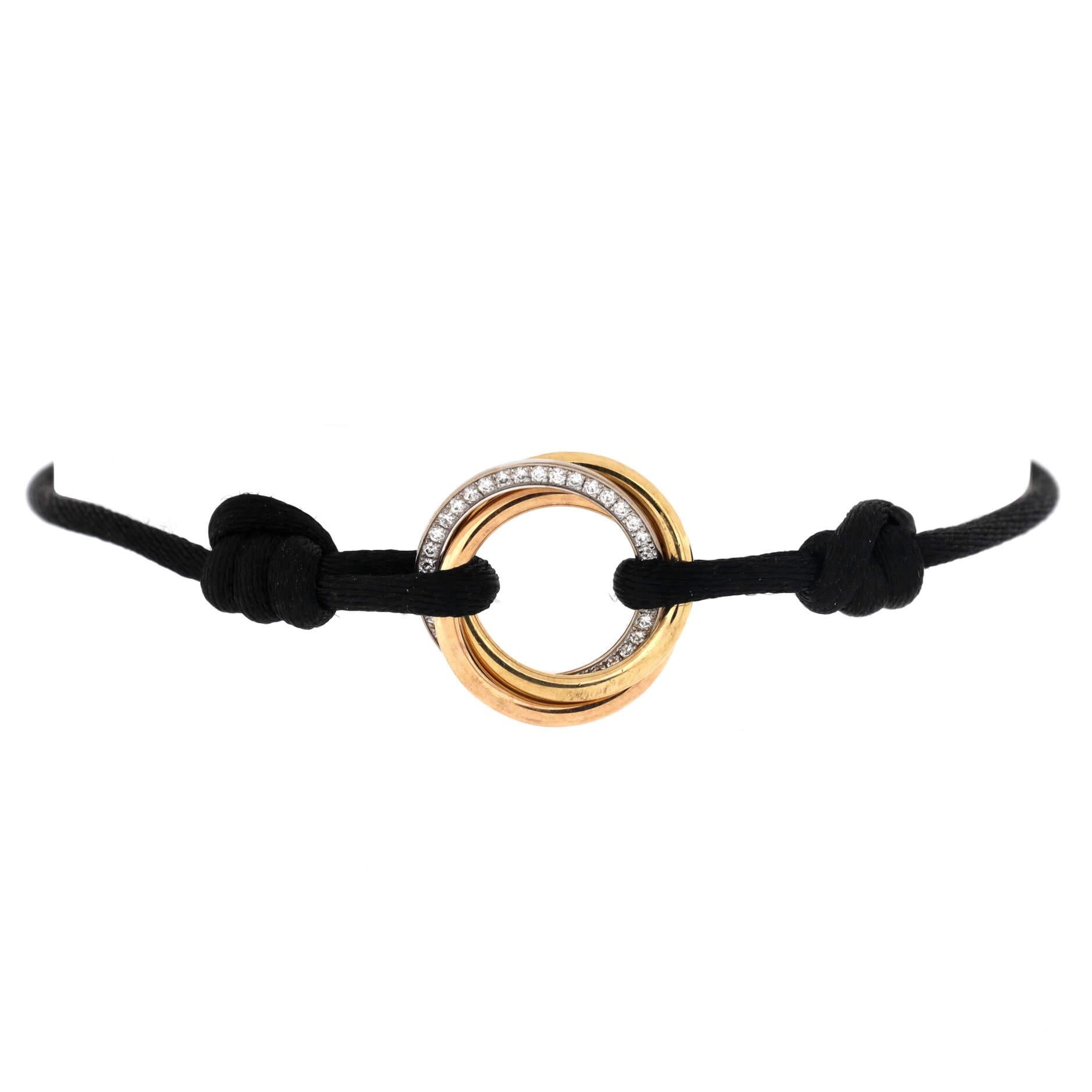 Cartier Trinity bracelet with two adjustable silk cords and - Catawiki