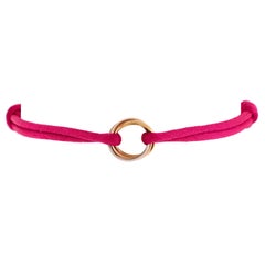 Cartier Bracelet Trinity On Cord en cordon de soie avec or tricolore 18 carats
