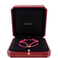 Cartier Bracelet Trinity On Cord en cordon de soie avec or tricolore 18 carats