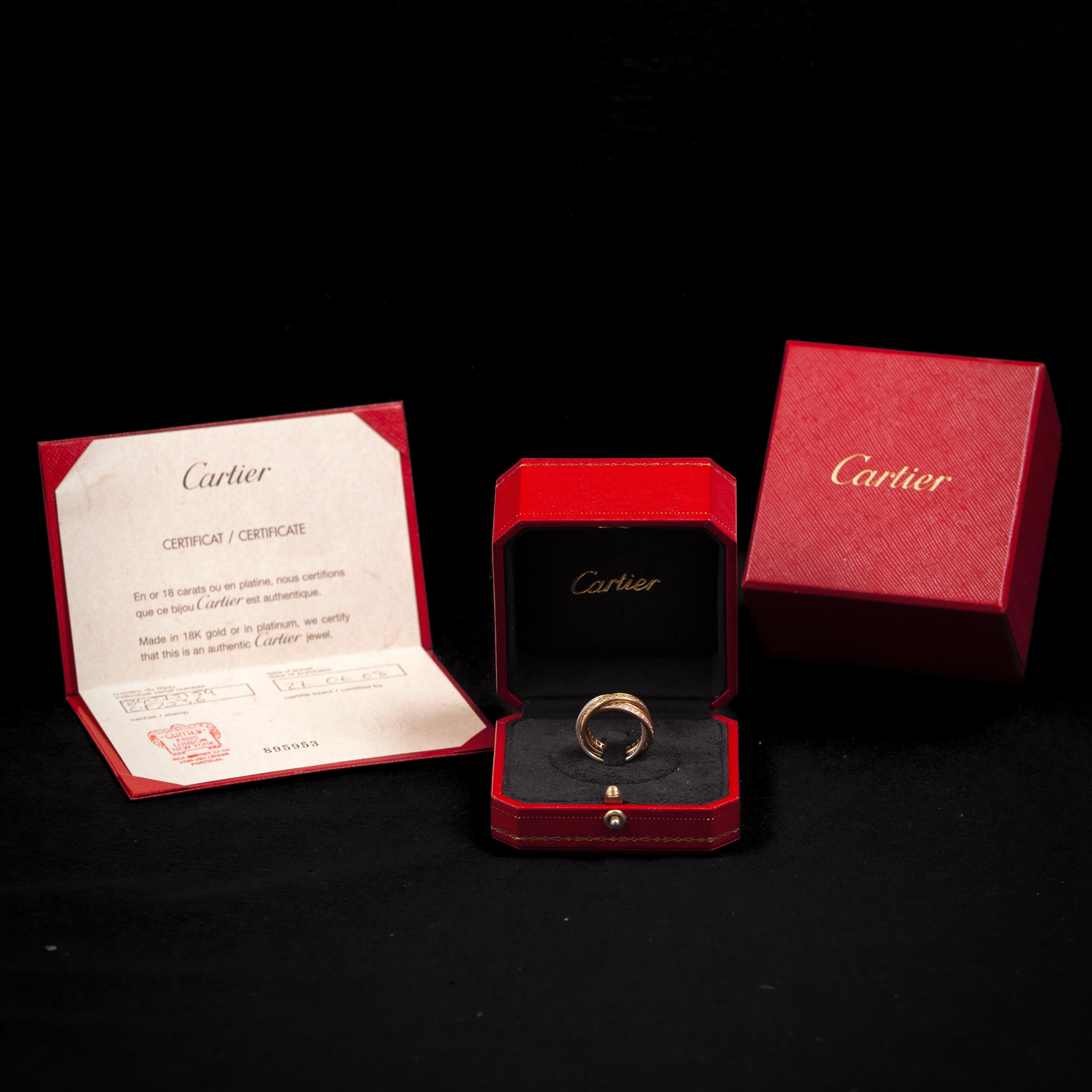 Cartier Trinity Pavé Diamond ring in 18kt tricolor gold, France, from 2008, full set with Box and Cartier Certificate.

A stunning Cartier Trinity ring, crafted in 18k yellow, white, and rose gold, fully set with round brilliant-cut diamonds in a