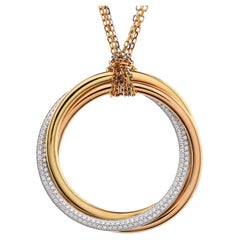 Cartier Trinity-Halskette mit Anhänger aus 18 Karat dreifarbigem Gold mit Diamanten groß