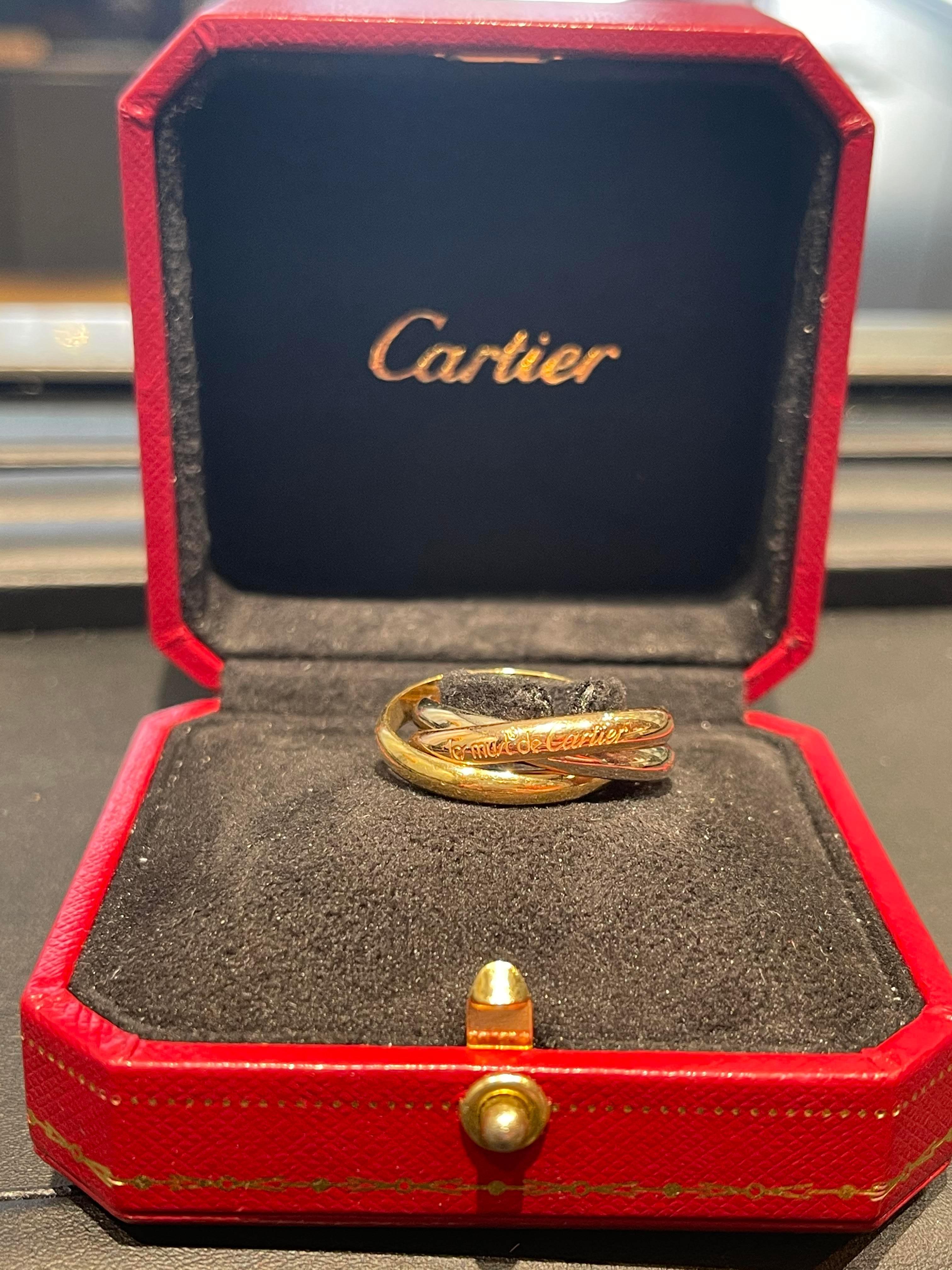 cartier trinity ring on hand