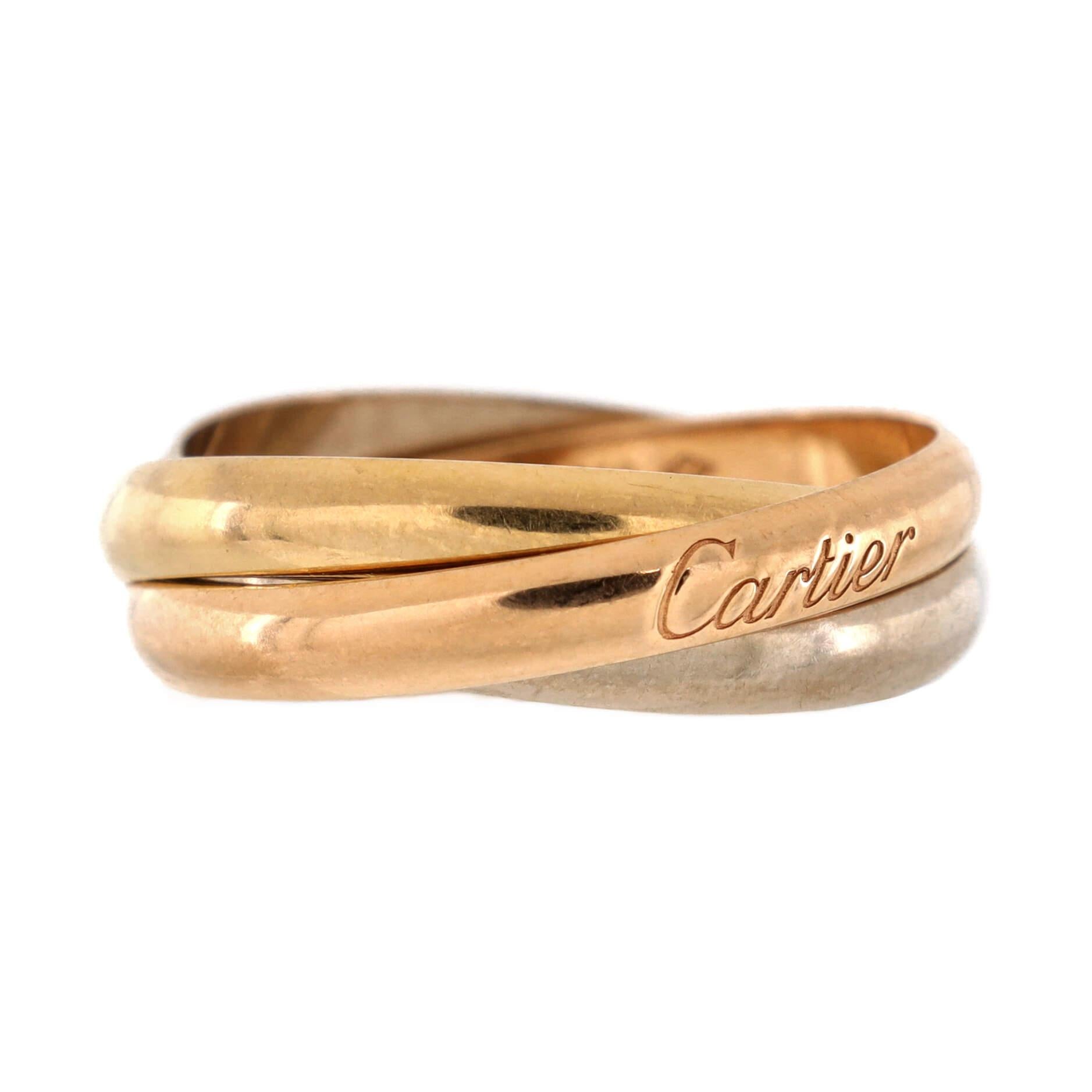 Condition: Good. Moderately heavy wear throughout.
Accessories: No Accessories
Measurements: Size: 7.5 - 56, Width: 2.8 mm
Designer: Cartier
Model: Trinity Ring 18K Tricolor Gold Small
Exterior Color: Tricolor Gold
Item Number: 202637/1