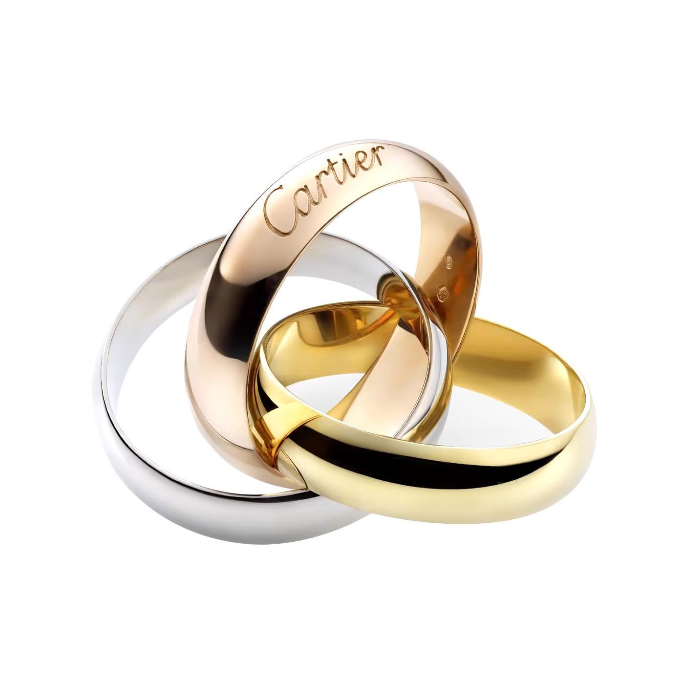 Trinity ring, medium model, 18K white gold (750/1000), 18K rose gold (750/1000), 18K yellow gold (750/1000). Width: 3.53 mm (for size 53).

Details:
Brand: Cartier
Type: Trinity ring
Metal Purity: 18k White Gold / 18K Rose Gold / 18K Yellow