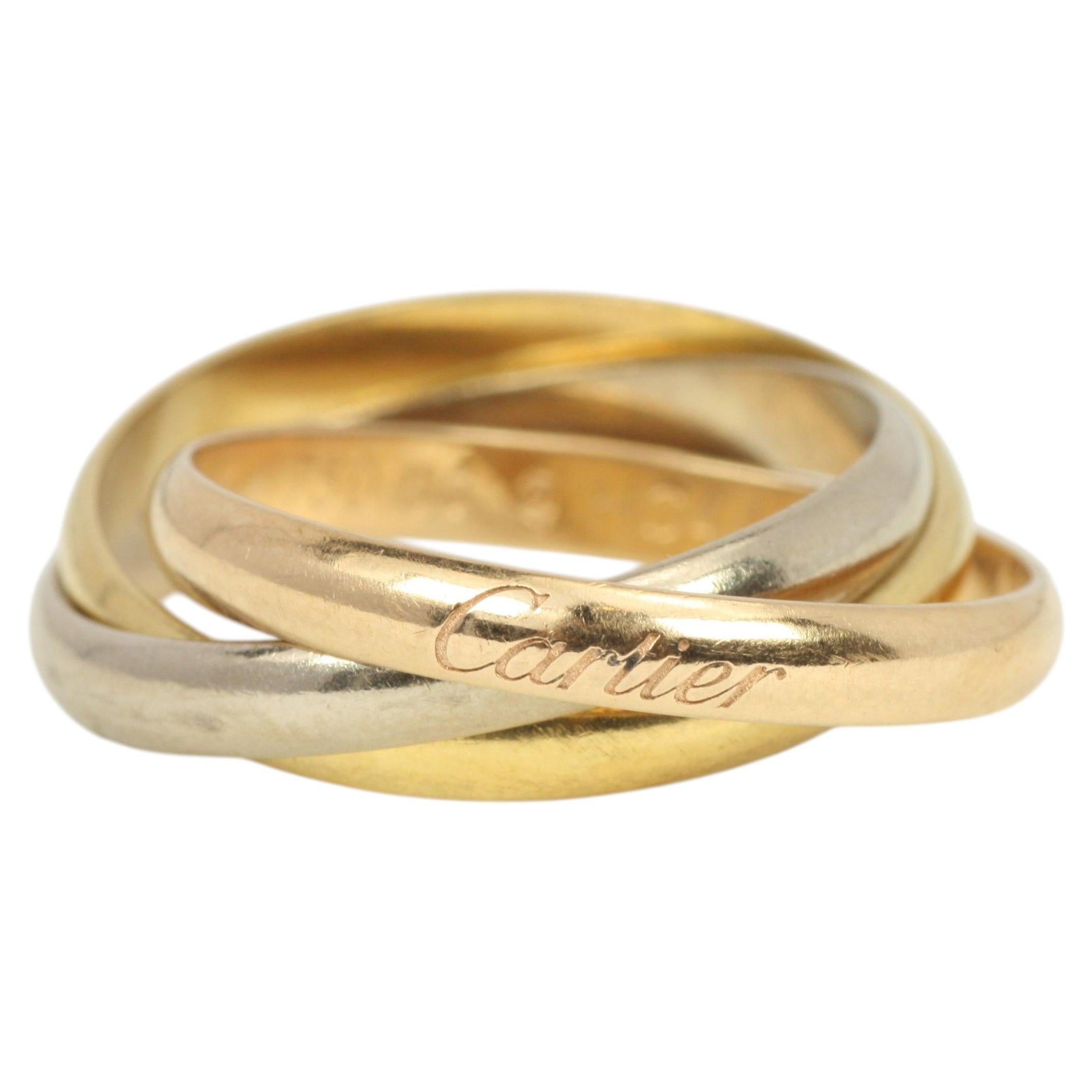 Bague Trinity de Cartier en or rose, jaune et blanc 18 carats en vente