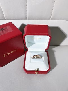 Cartier Trinity Ring in 18k Three-Tone Gold with Star-Set Diamond Accent