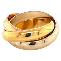Anello Trinity Cartier in oro giallo, bianco e rosa 18 carati